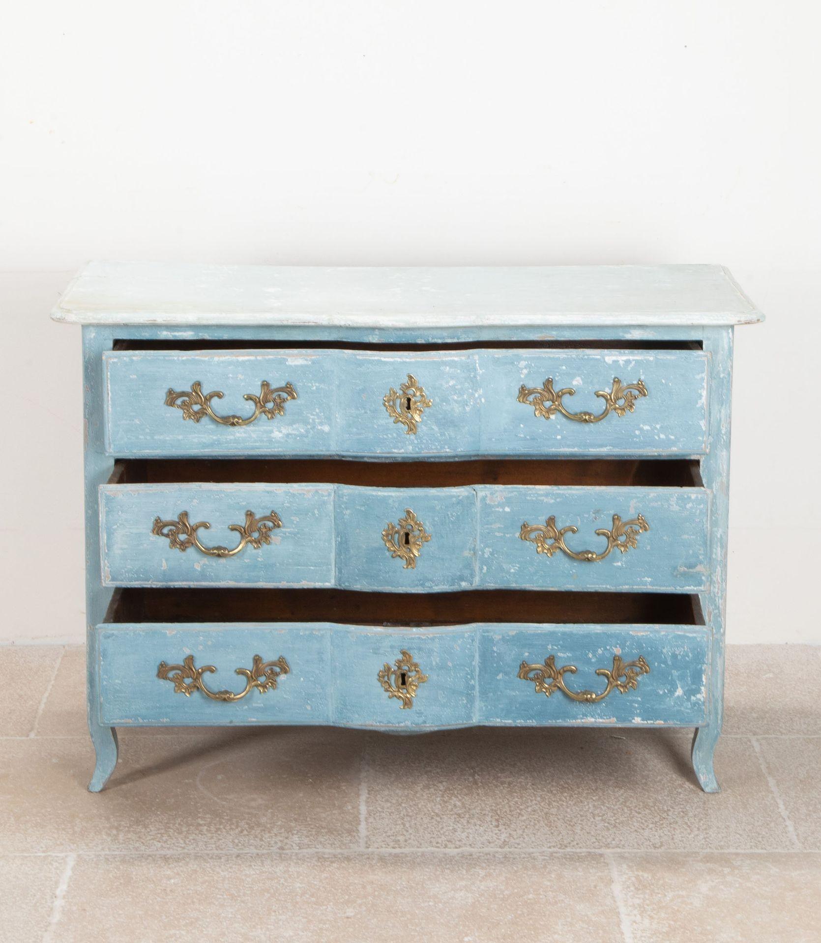 Late 18th Century French commode.
Mid-blue shade of scraped back paint and a pale top.
Circa 1790.