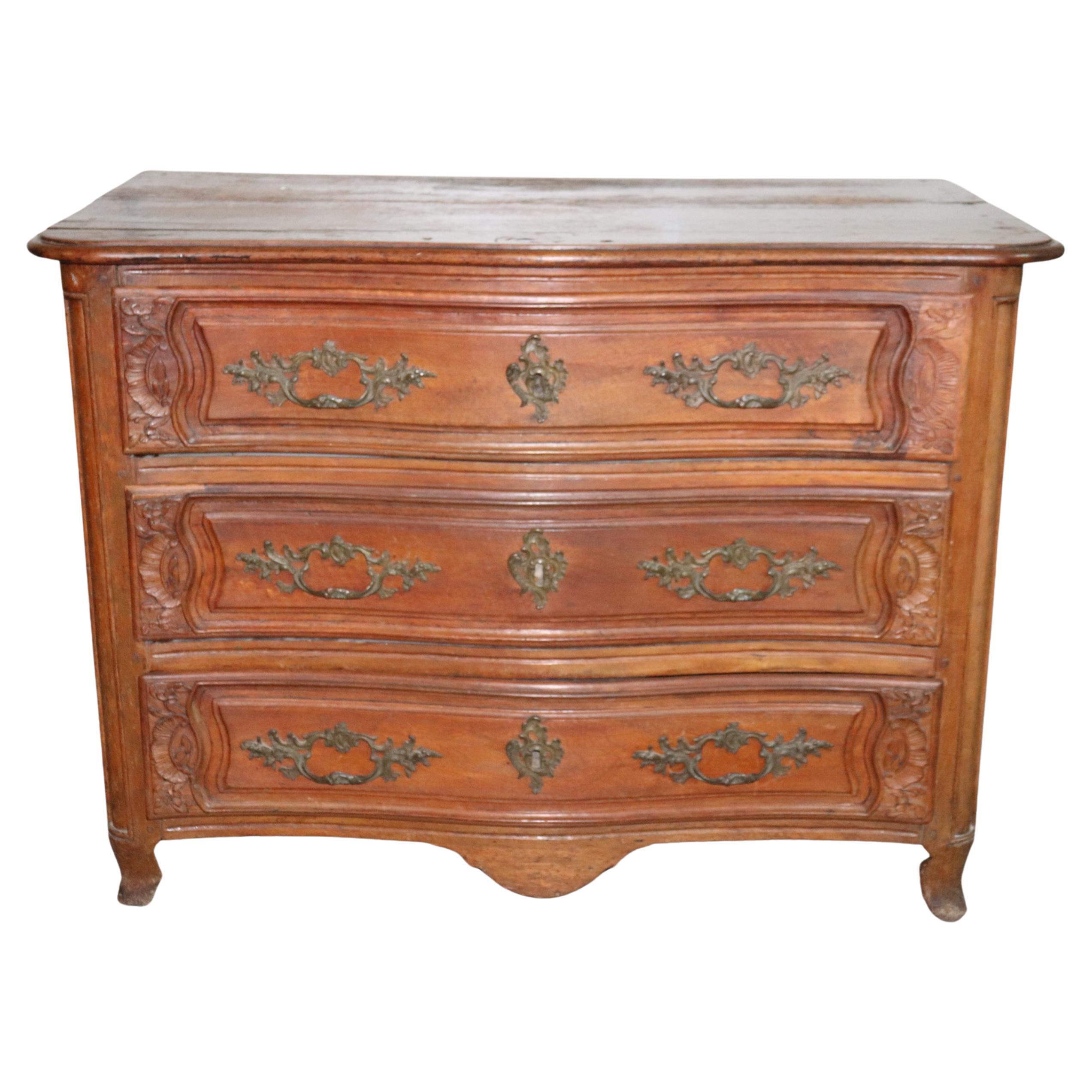 Late 18th Century French Country Walnut Commode with Bronze Hardware For Sale