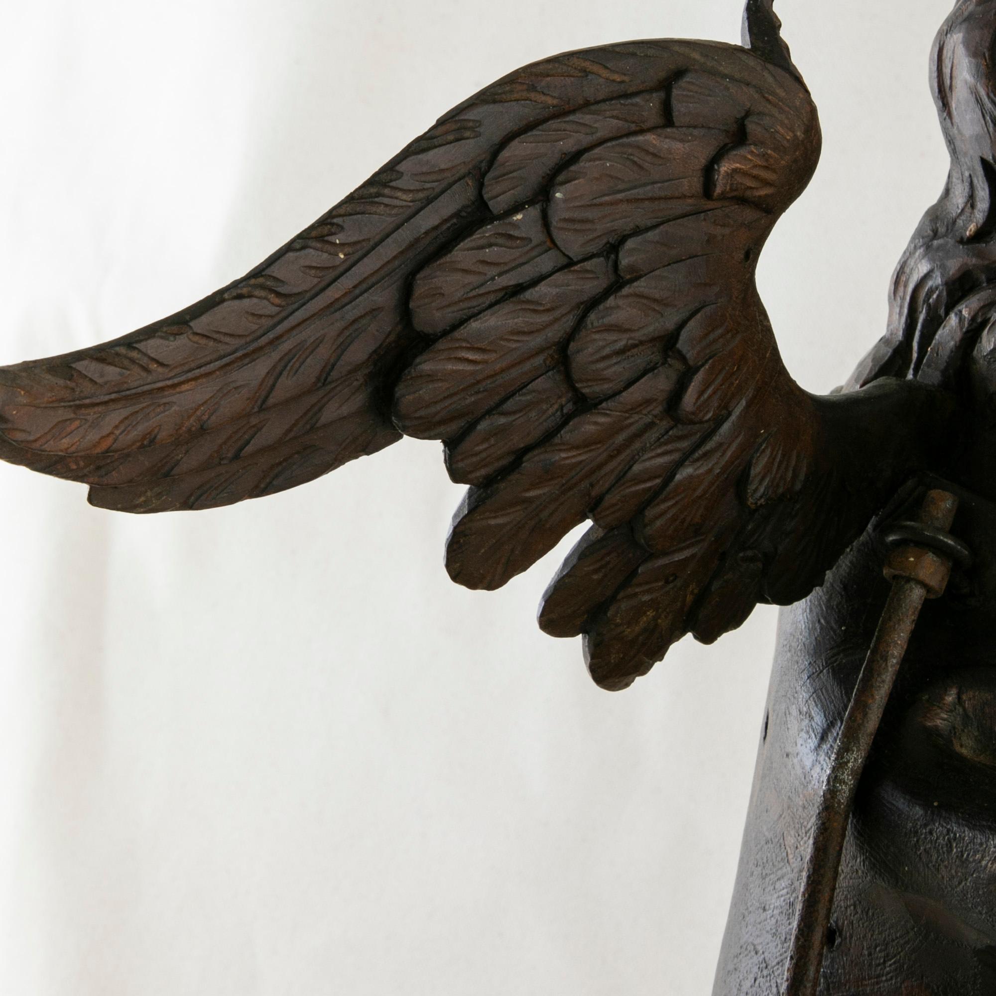 Late 18th Century French Hand Carved Angel Sculpture Mounted on Iron Stand 6