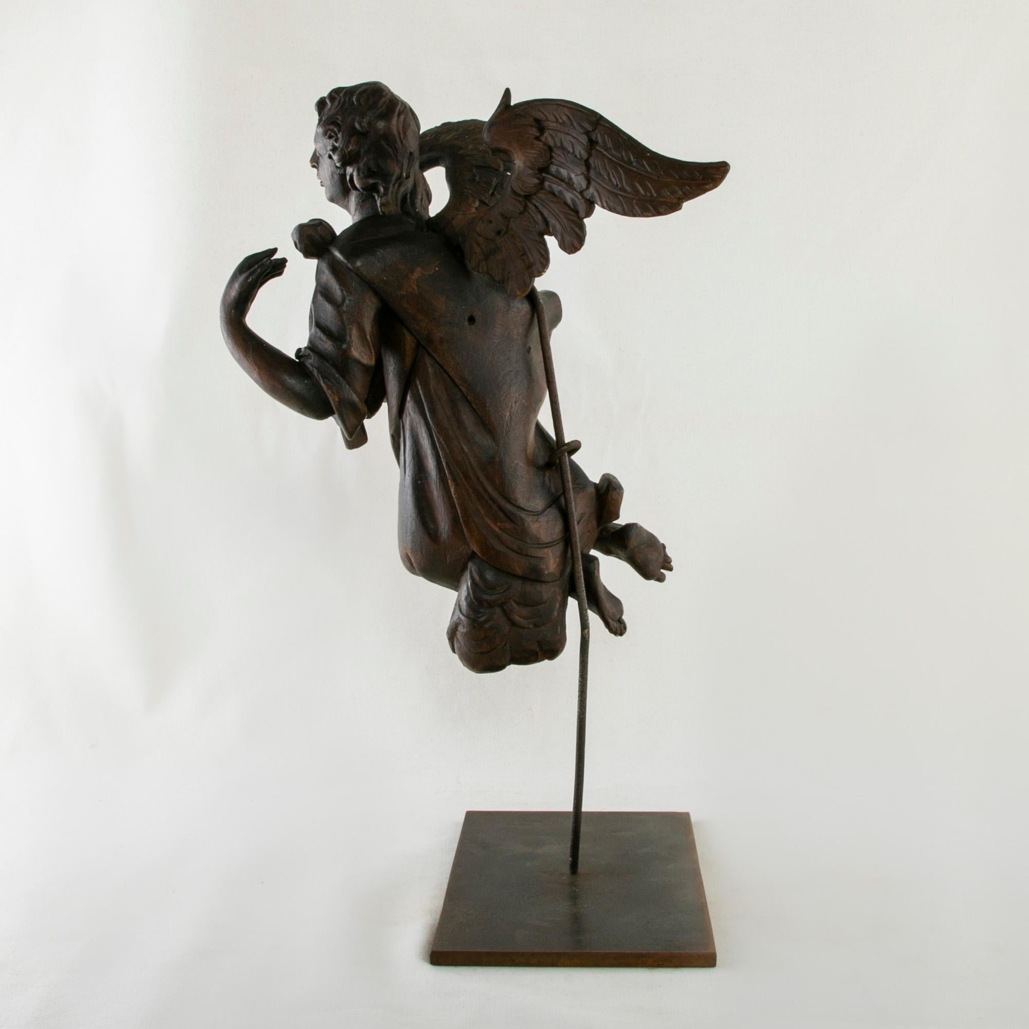 Hand-Carved Late 18th Century French Hand Carved Angel Sculpture Mounted on Iron Stand