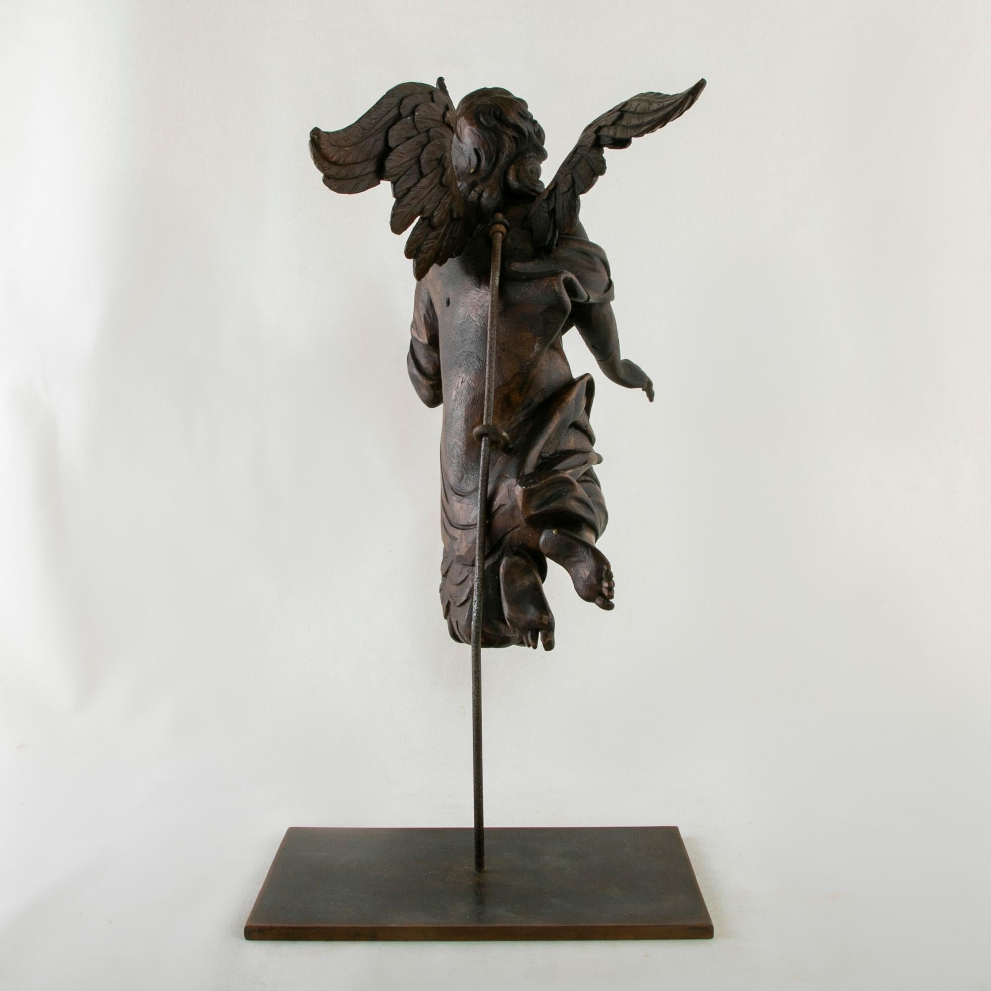 Late 18th Century French Hand Carved Angel Sculpture Mounted on Iron Stand In Good Condition In Fayetteville, AR