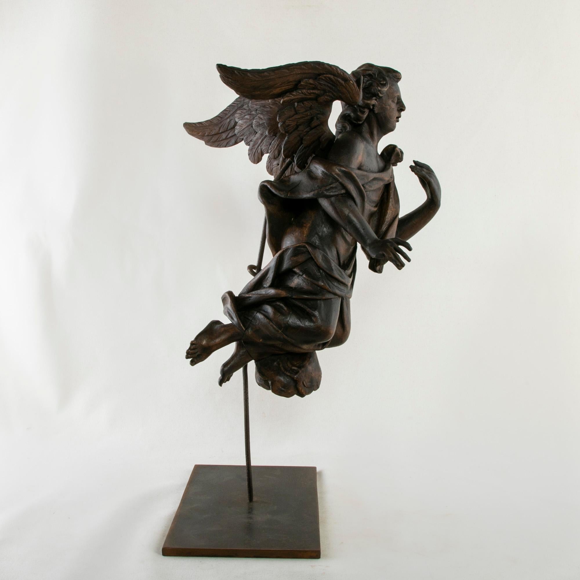 Wood Late 18th Century French Hand Carved Angel Sculpture Mounted on Iron Stand