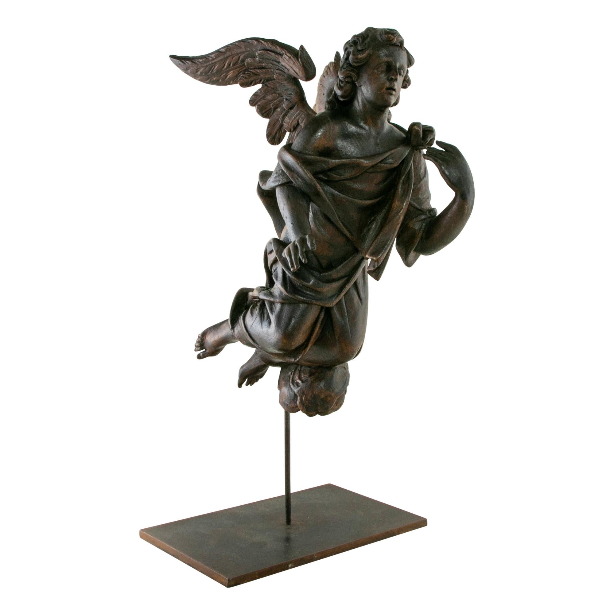 Late 18th Century French Hand Carved Angel Sculpture Mounted on Iron Stand