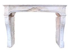 Late 18th Century French Limestone Fireplace