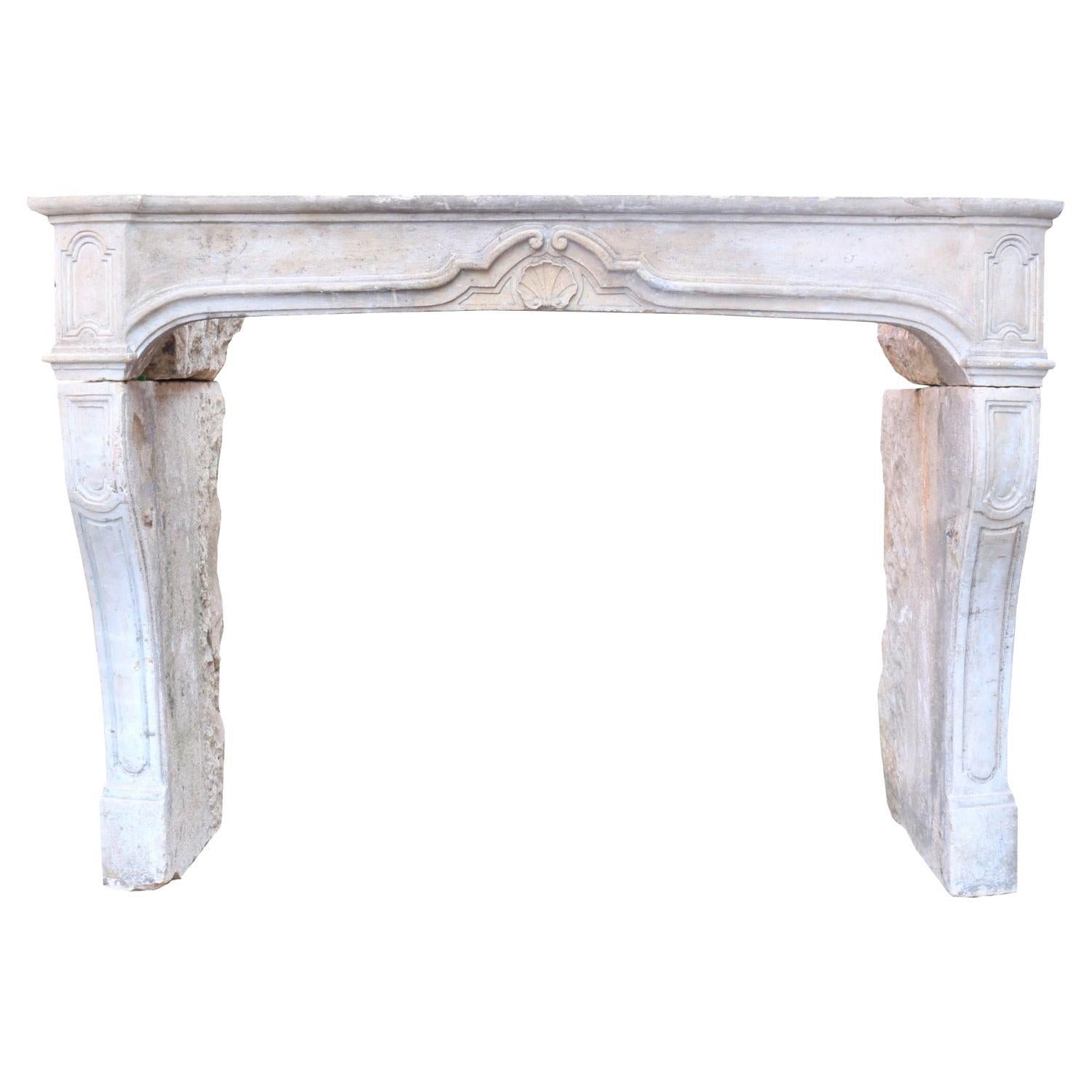 Late 18th Century French Limestone Fireplace For Sale