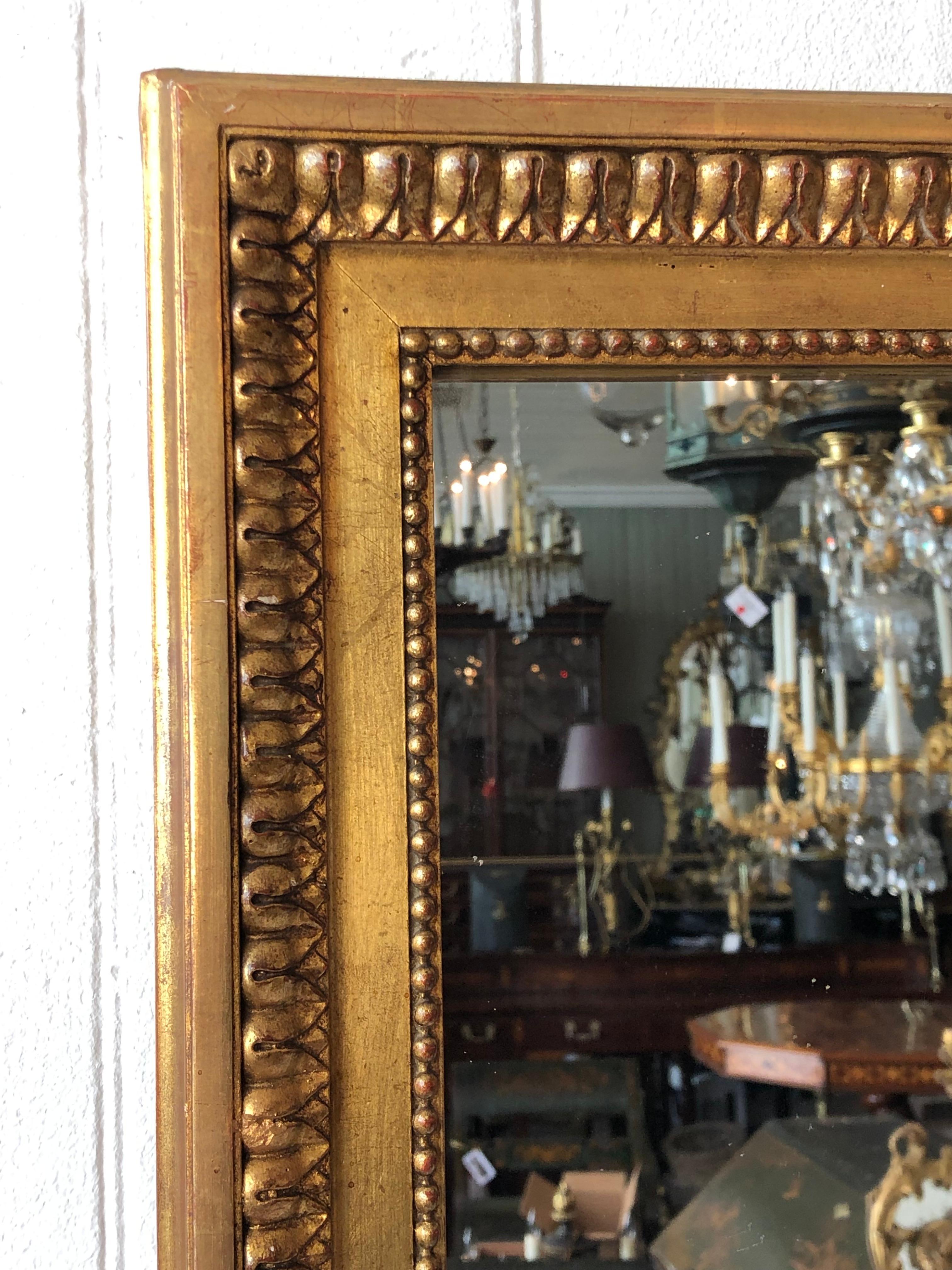 Late 18th Century French, Louis XVI Carved Giltwood Overmantle Mirror In Good Condition In Charleston, SC