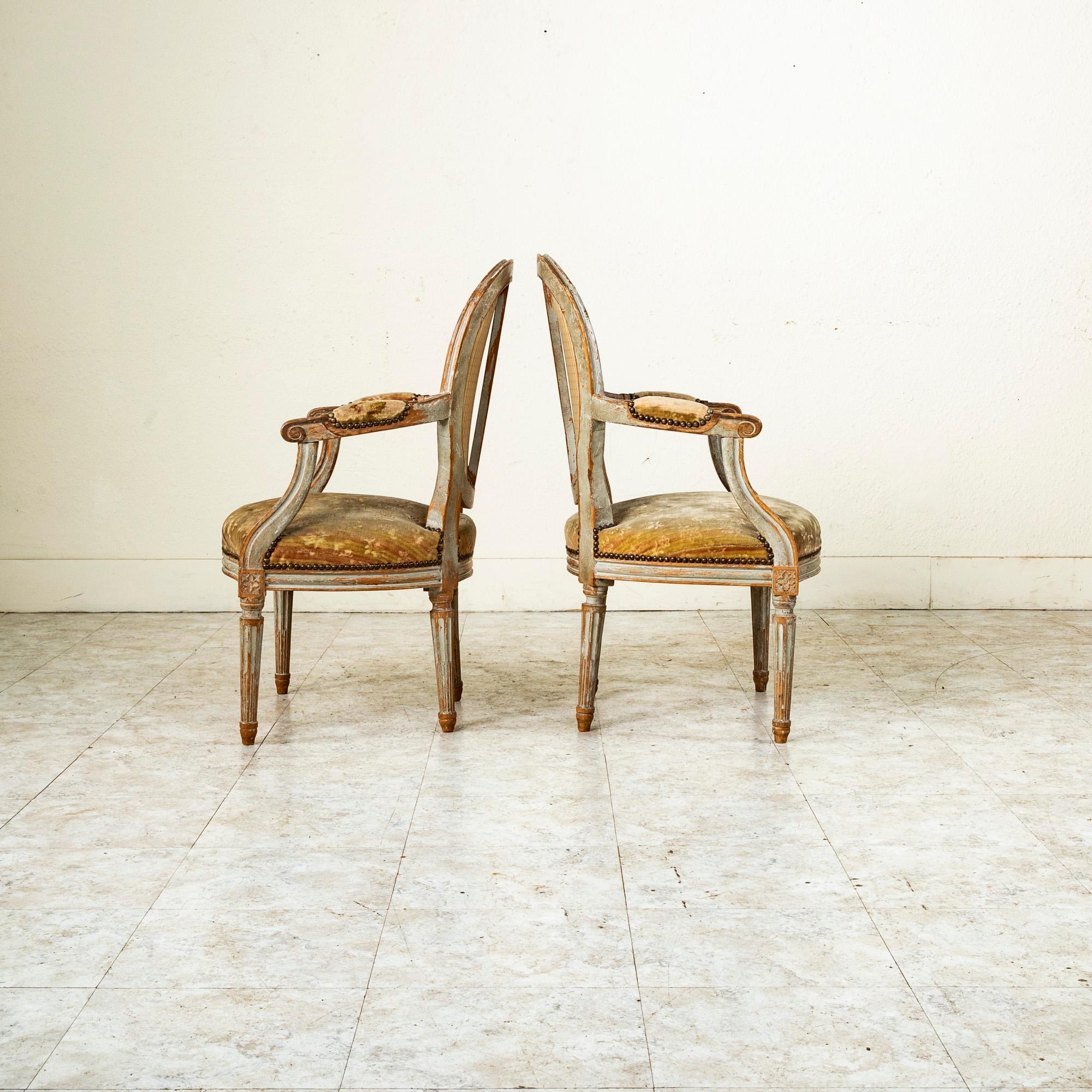 Hand-Carved Late 18th Century French Louis XVI Period Hand Carved Walnut Armchairs For Sale