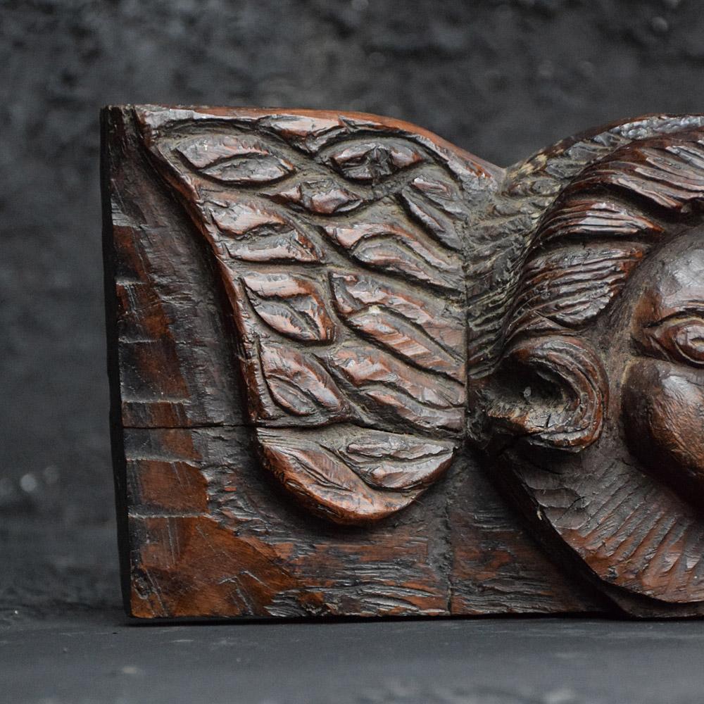 Late 18th century oak panel

We are proud to offer a wonderfully aged late 18th century hand carved oak panel, depicting an angel with open wings. The form is typical of the period and likely to be French or Italian in origin. This artifact is