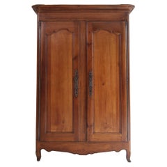 Armoire en merisier et chêne de la fin du XVIIIe siècle, de style provincial français