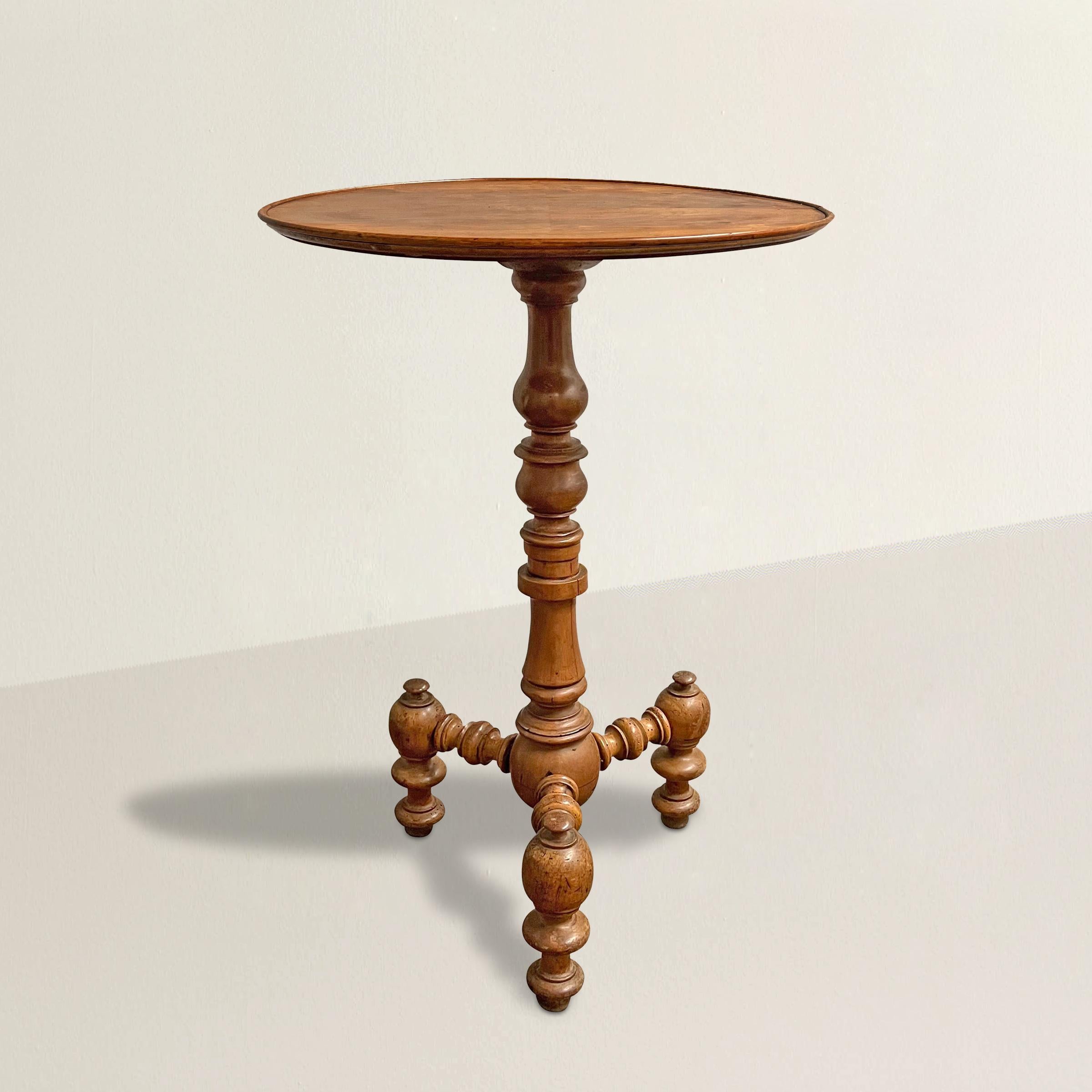Experience the timeless beauty and charm of this late 18th-century French Provincial hand-carved fruitwood side table. Crafted with meticulous artistry, this exquisite piece is a testament to the skilled hands of its creators. The ornately turned