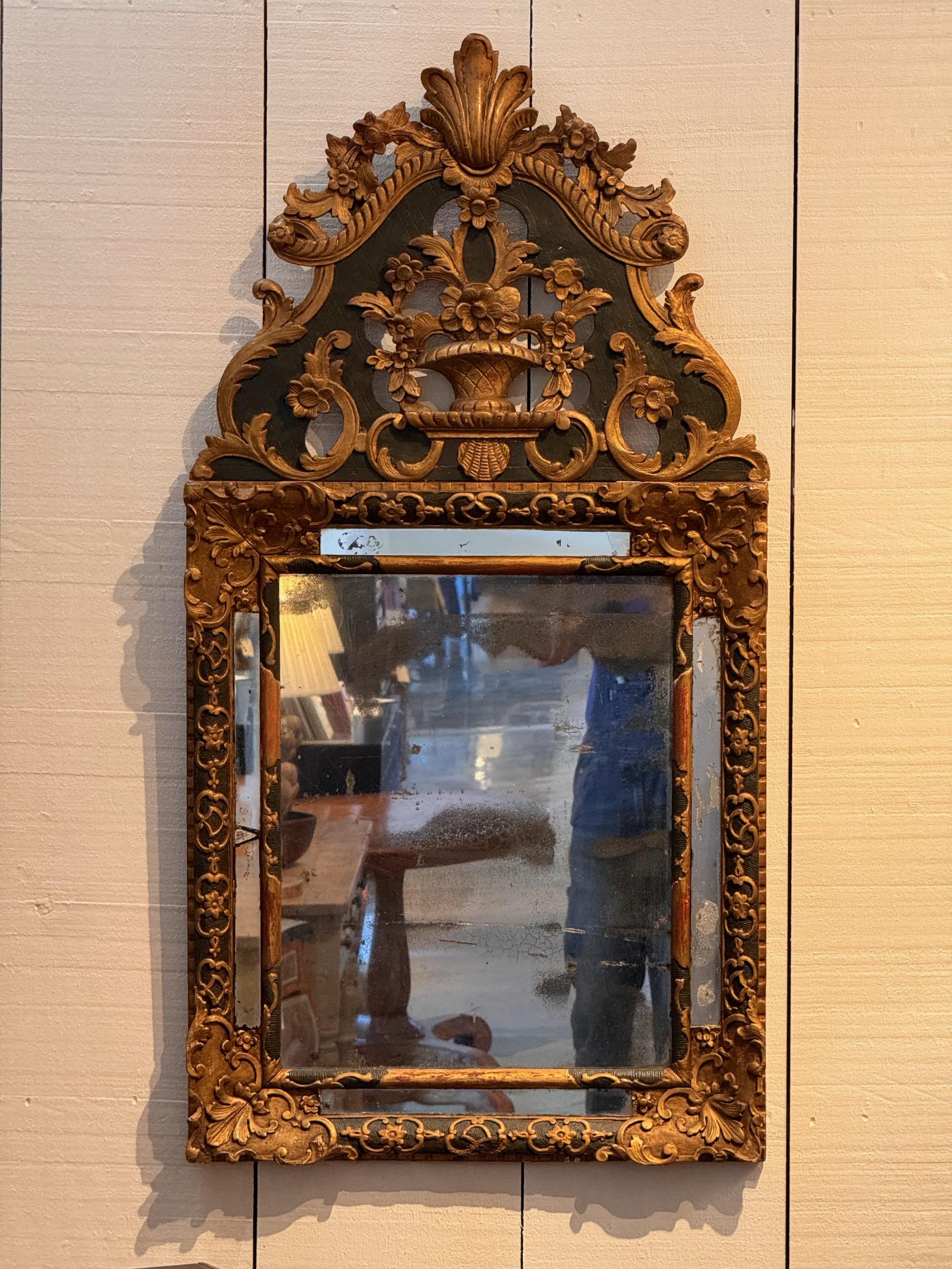 This is a handsome French Mirror with gilt decoration. Instant beauty.