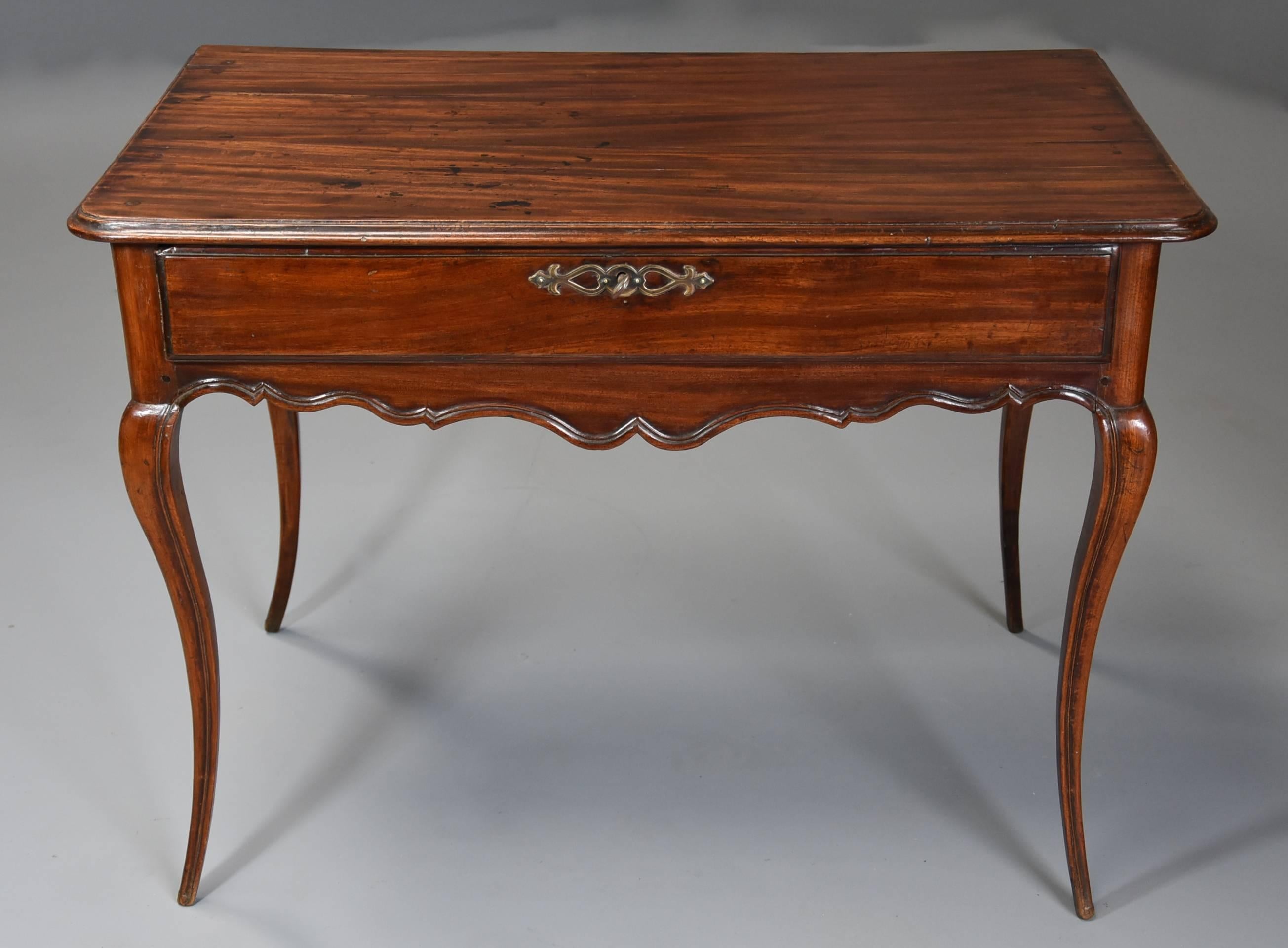A late 18th-early 19th century (circa 1800) French walnut side table with superb original rich patina (color).

This table consists of a finely figured walnut top with a moulded edge.

This leads down to a long pine lined walnut drawer also with