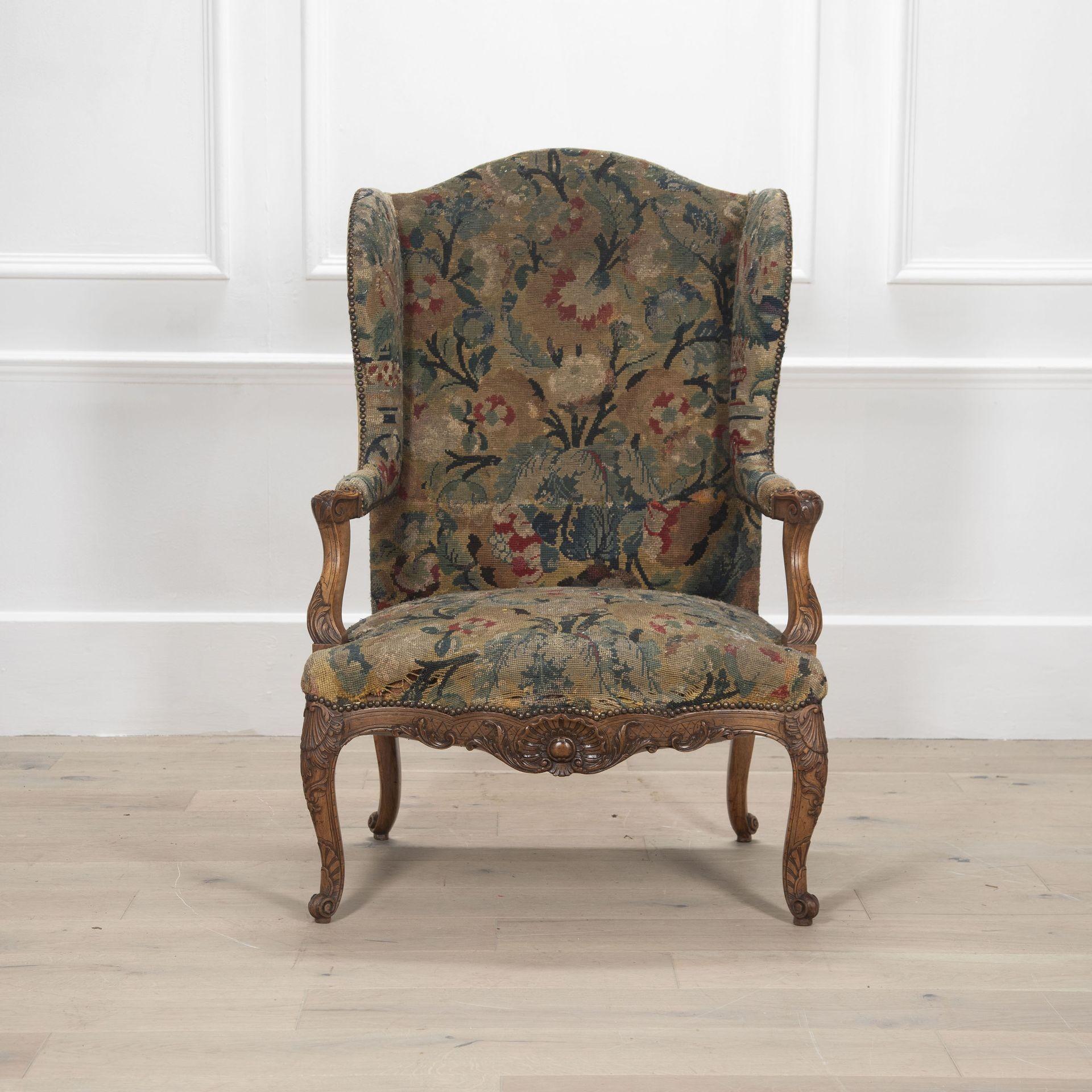 A handsome and well-proportioned 18th Century French wing Bergere.
With a carved walnut frame covered in tapestry.
Circa 1790.