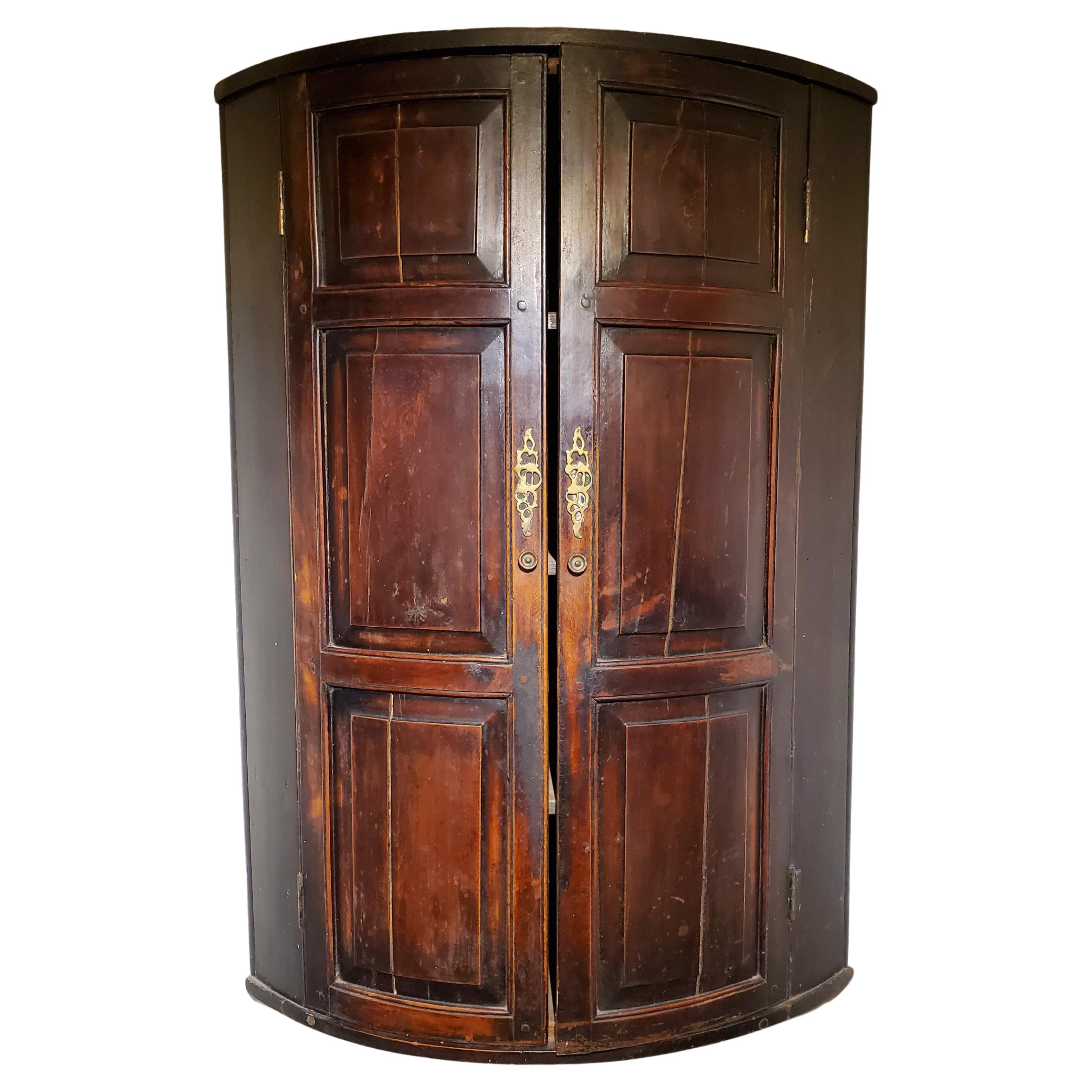 Late 18th Century George III English Bow Front Beech Wood Corner Cupboard For Sale