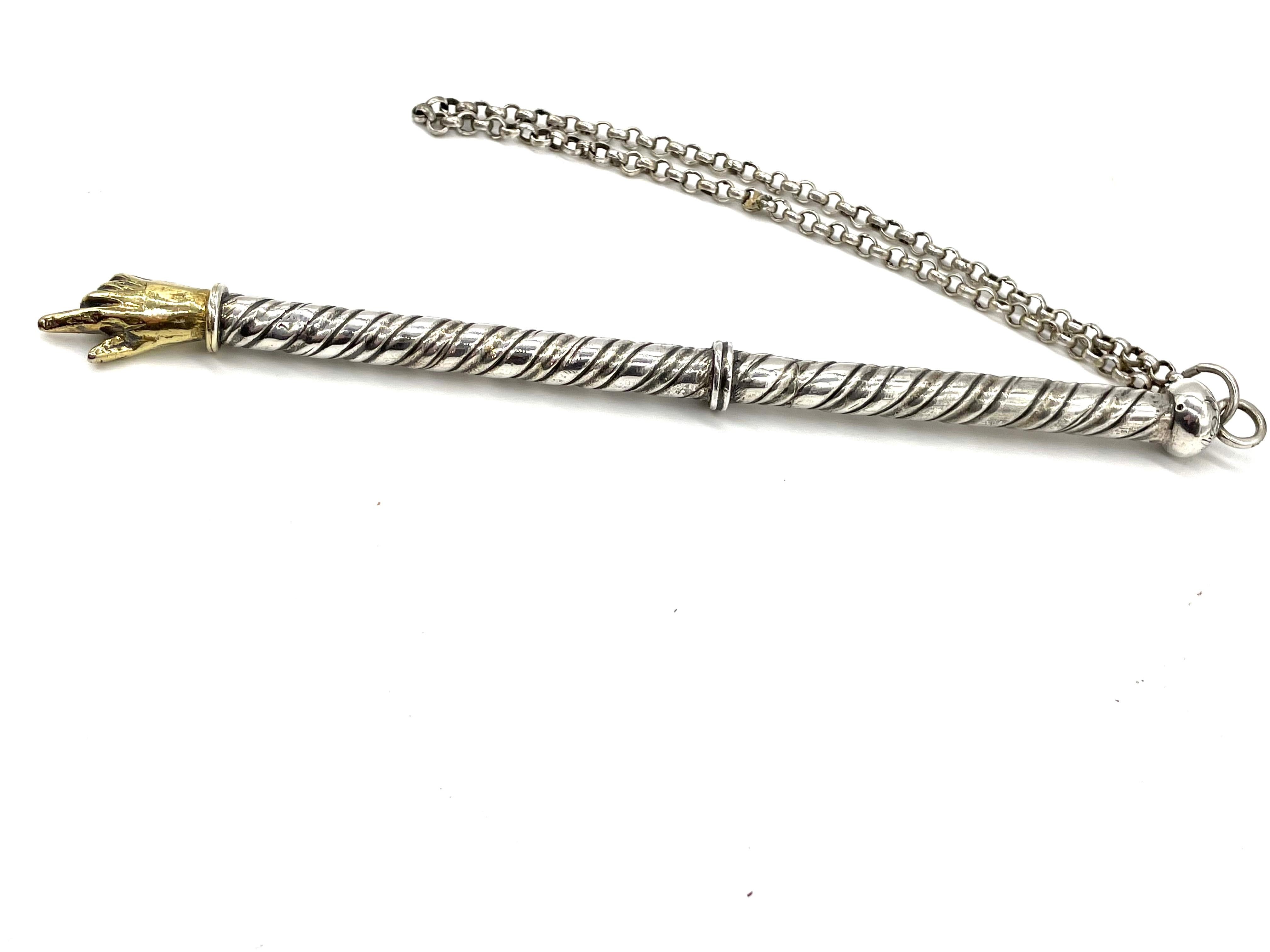 A late 18th century continental parcel-gilt silver Torah pointer made in Germany. This magnificent torah pointer is shaped in a tapered spiral form. At one end of the pointer, a beautifully designed gilt hand, while at the other a small dome