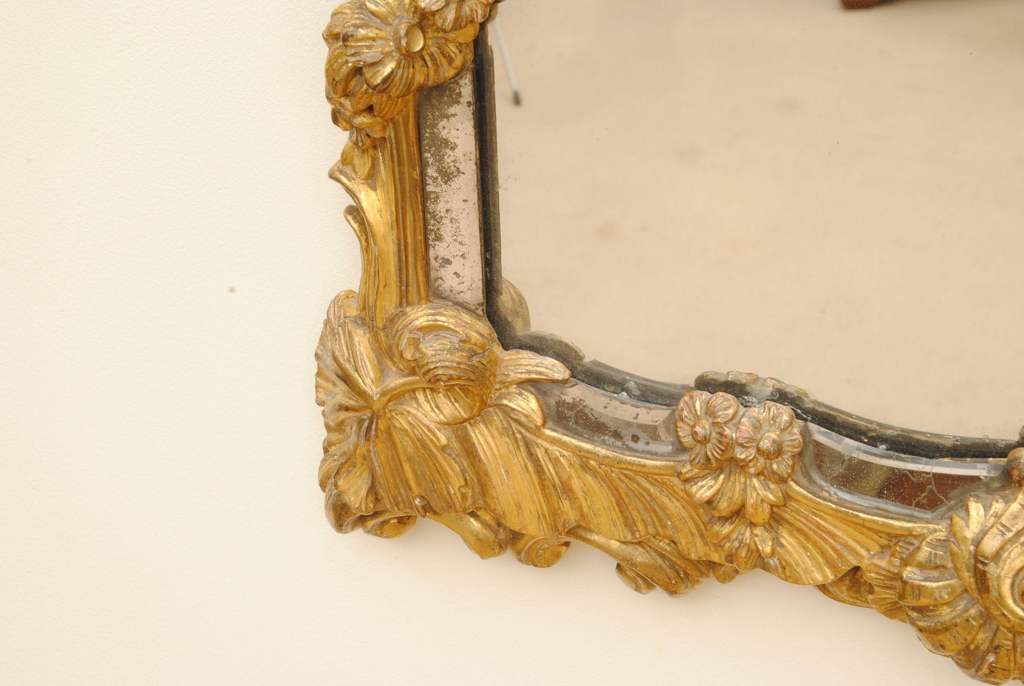 Carved Late 18th Century Gilt Wood And Bordered Mirror For Sale