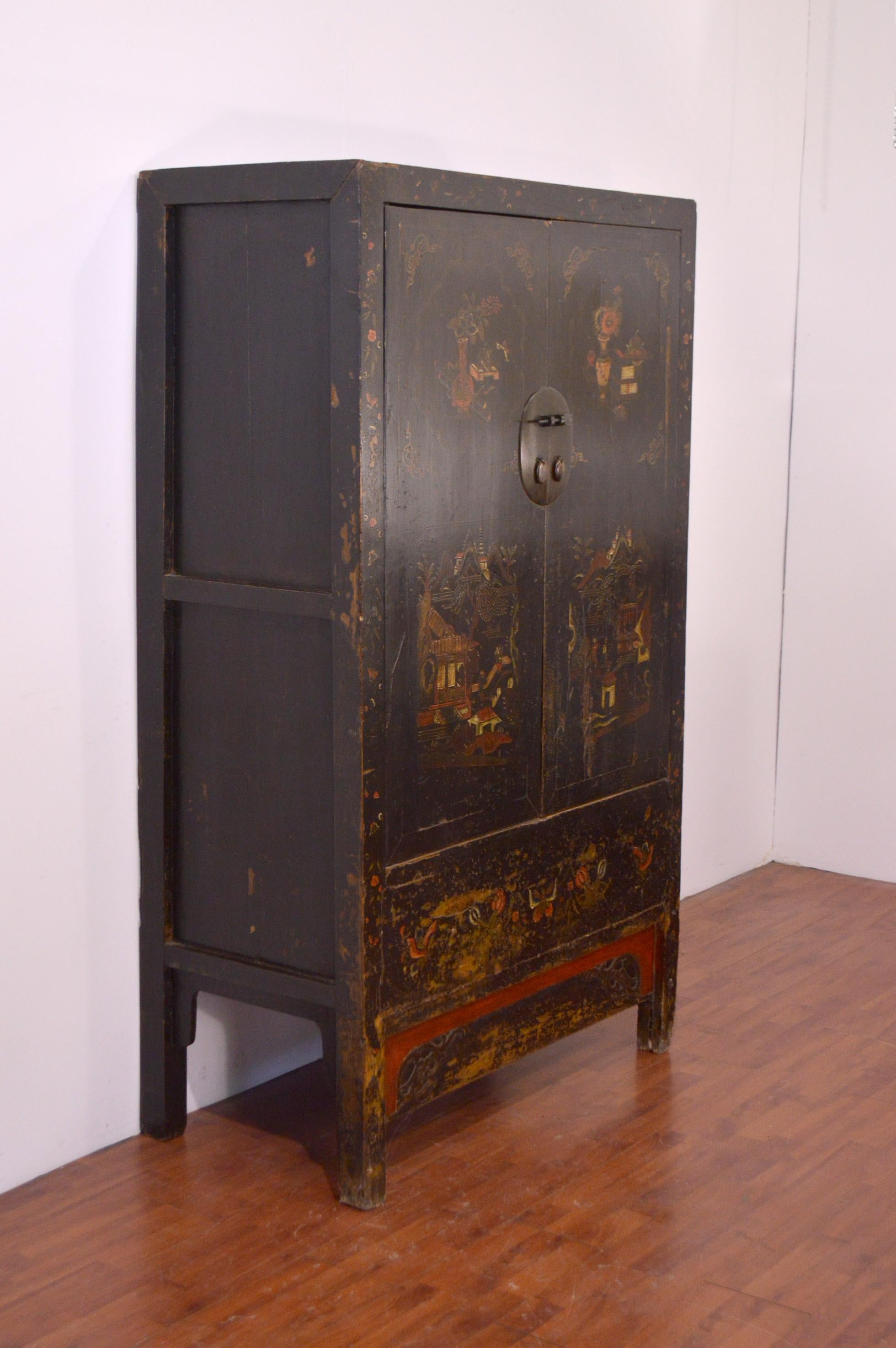 Beautiful cabinet with two doors, shelves with two drawers inside. Painted really fine and full of details. A tipical chinese wardrobe in very good conditions. Suitable to be combined with all styles of forniture.