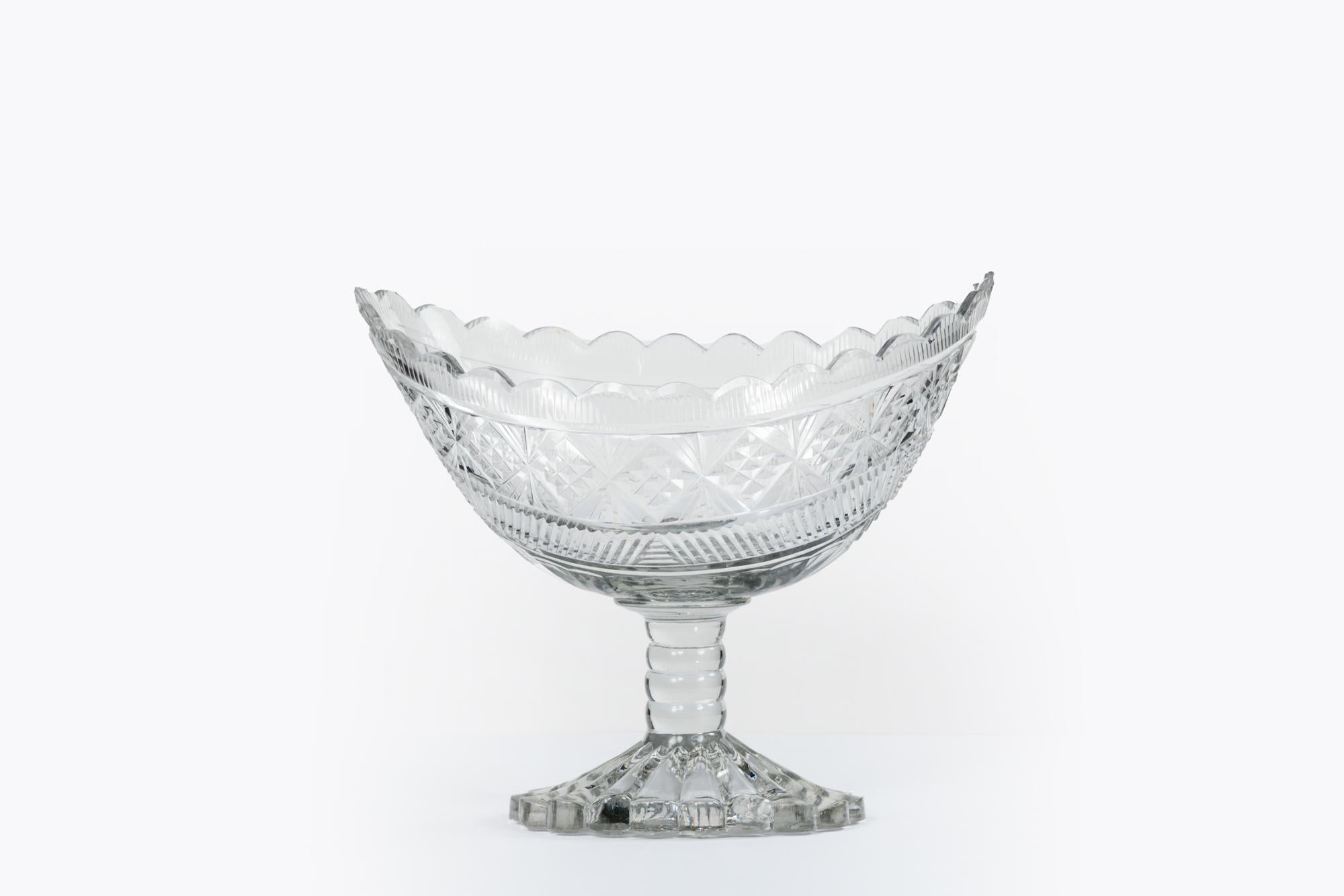 Late 18th Century Irish cut glass boat shaped centre bowl supported by turned stem. More than likely Waterford. C 1780.