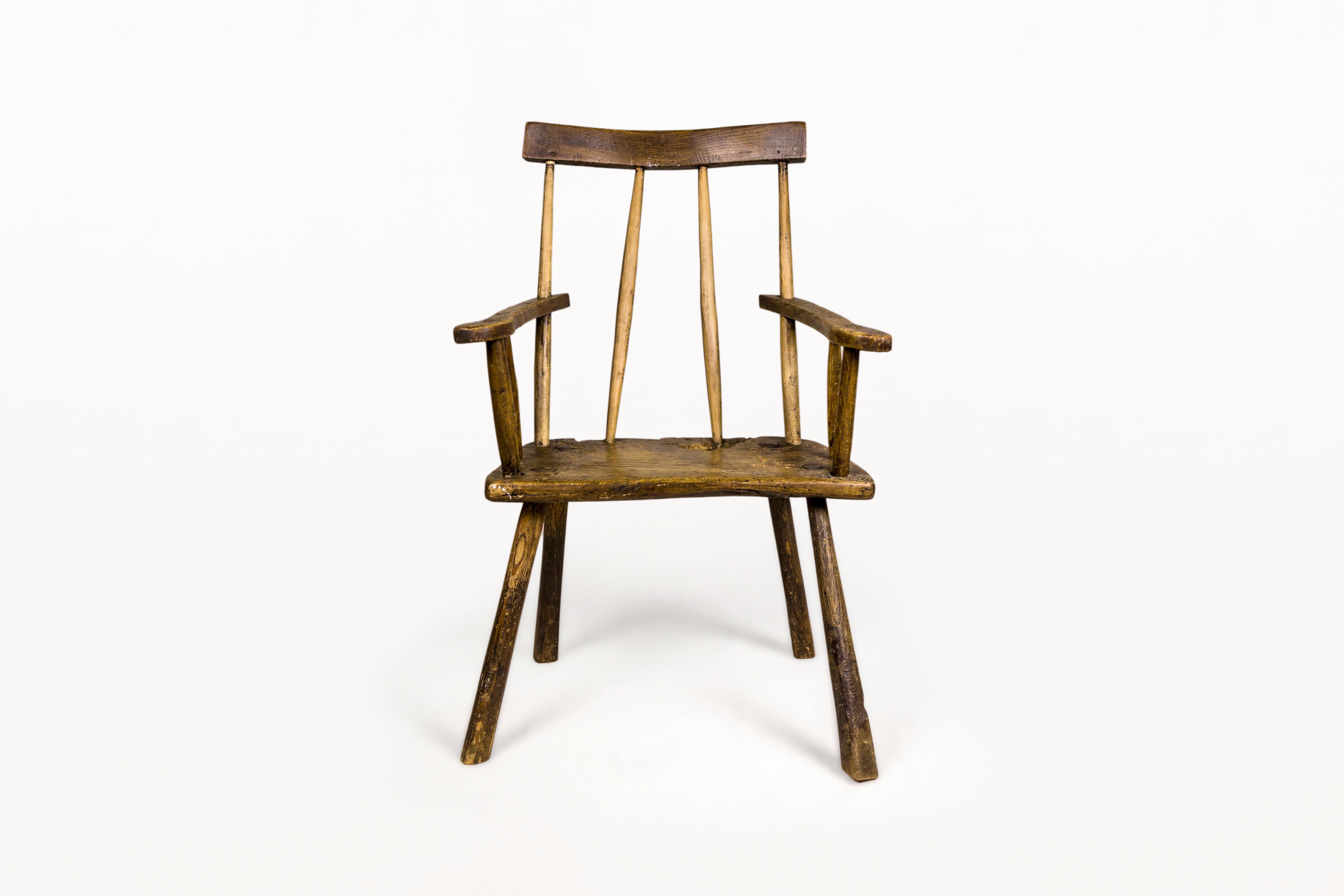 DESCRIPTION: Late 18th Century Irish Folk Art Armchair, Circa 1780, Ireland.
 Very decorative piece made with oak. 

CONDITION: Good condition. Wear consistent with age and use. 

DIMENSIONS: Height: 90cm (35.5in) Width: 65cm (25.5in) Depth: 46cm