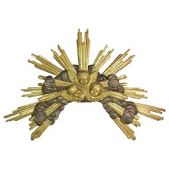 Late 18th Century Italian Baroque Carved Wooden Sunburst with Angelheads Late 18th Century Italian Baroque Carved Wooden Sunburst with Angelheads