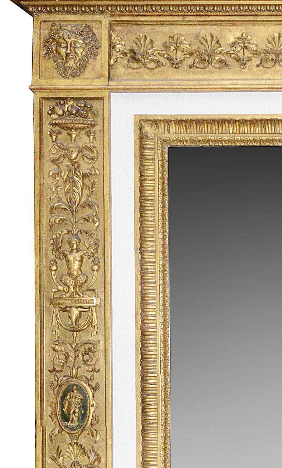 A very impressive late 18th Century Italian carved gilt-wood and gesso Pier glass wall mirror. Having wonderful Bacchus masks to either side, scrolling foliate, ribbon decoration with classical figures, busts and urns to the surround.
 
Batch 74.  
