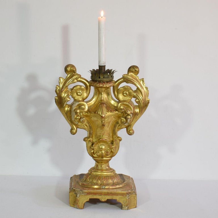 Unique Baroque giltwood candleholder, Italy, circa 1780. Weathered, repairs and losses.