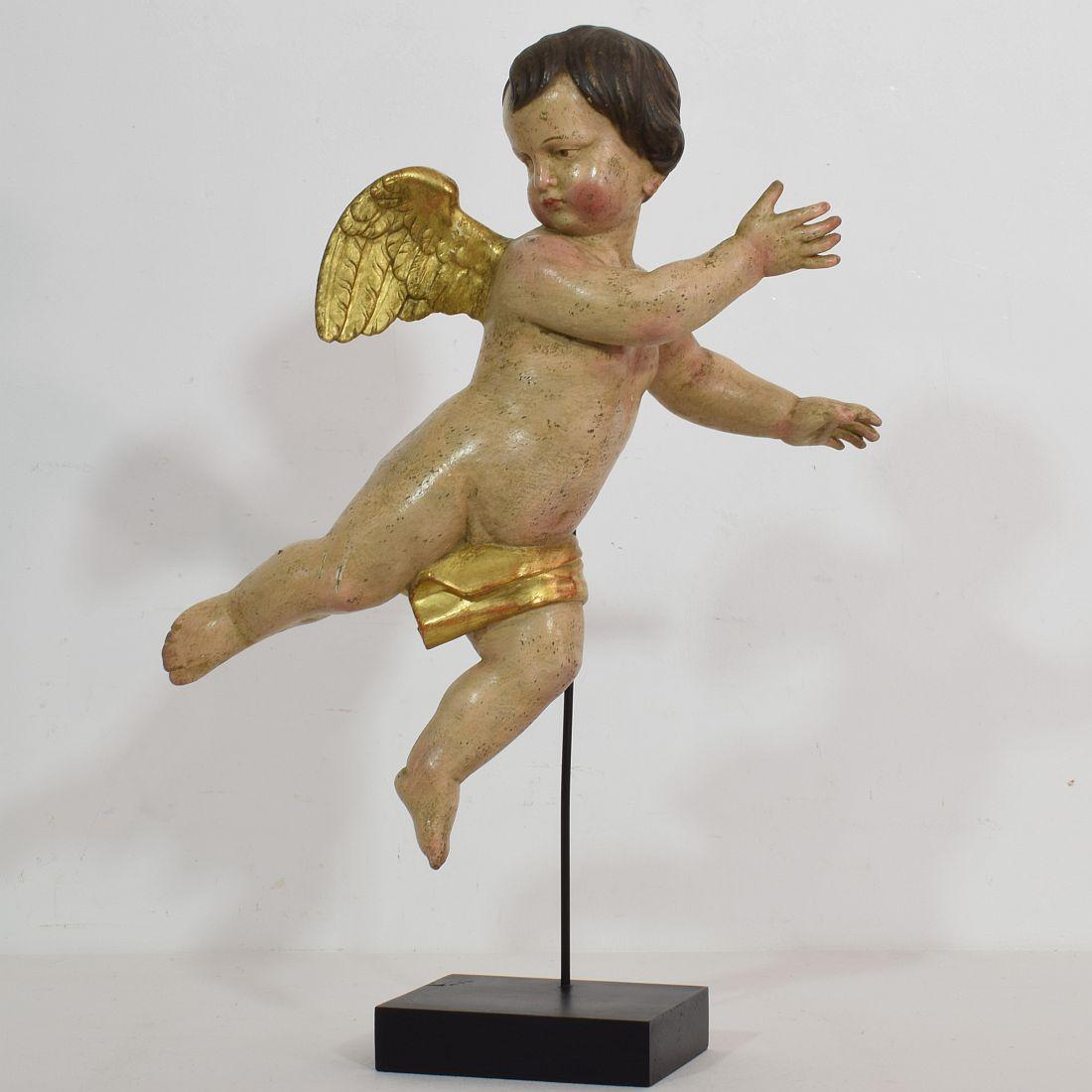 Stunning small carved wooden Baroque angel.
Very beautiful item,
Italy, circa 1790. Weathered and small losses.
Measurement includes the wooden base.
More pictures available on request.