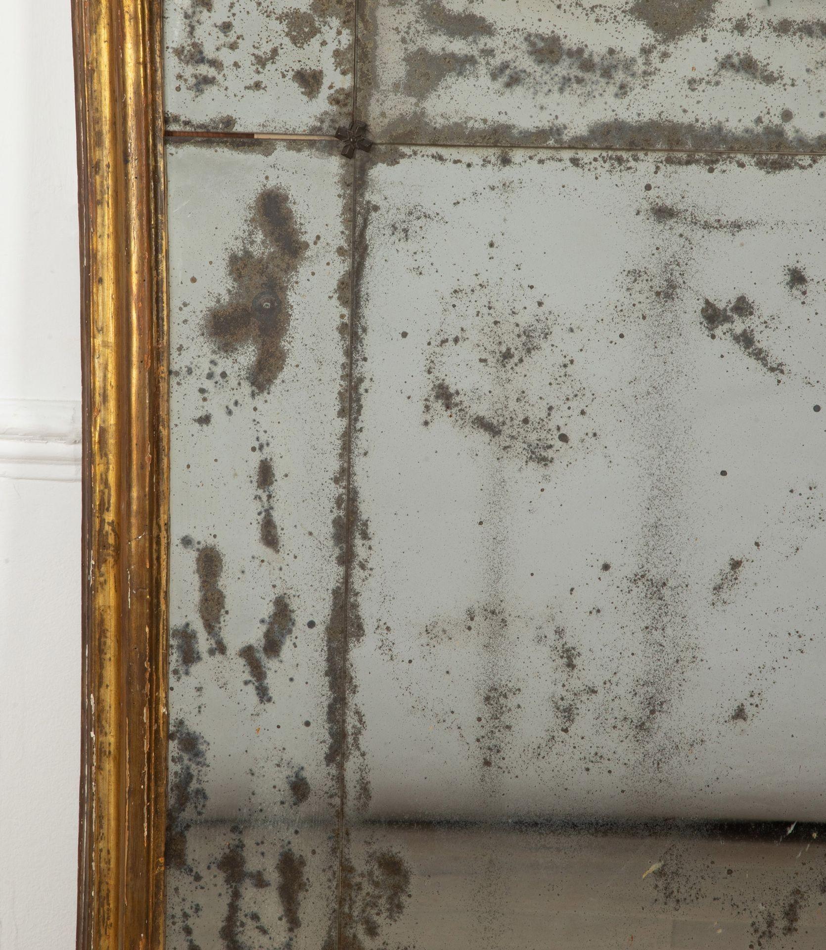 A wonderfully aged late 18th Century Italian giltwood segmented mirror.
Circa 1800.