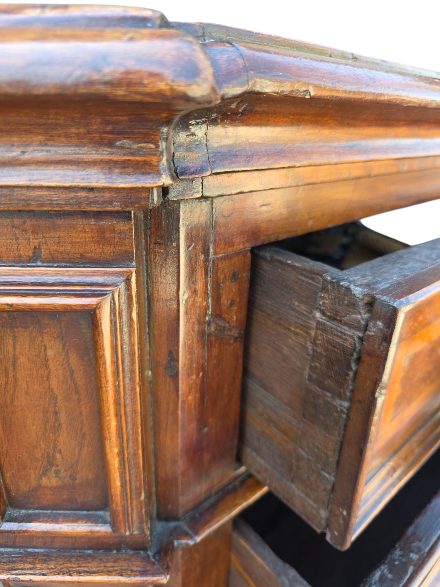 18th Century unusual tall chest of drawers in walnut with bronze with inlay detail.  Original backing.  Purchased out of a fine old home in Montecito, California.  Great scale and very unusual.