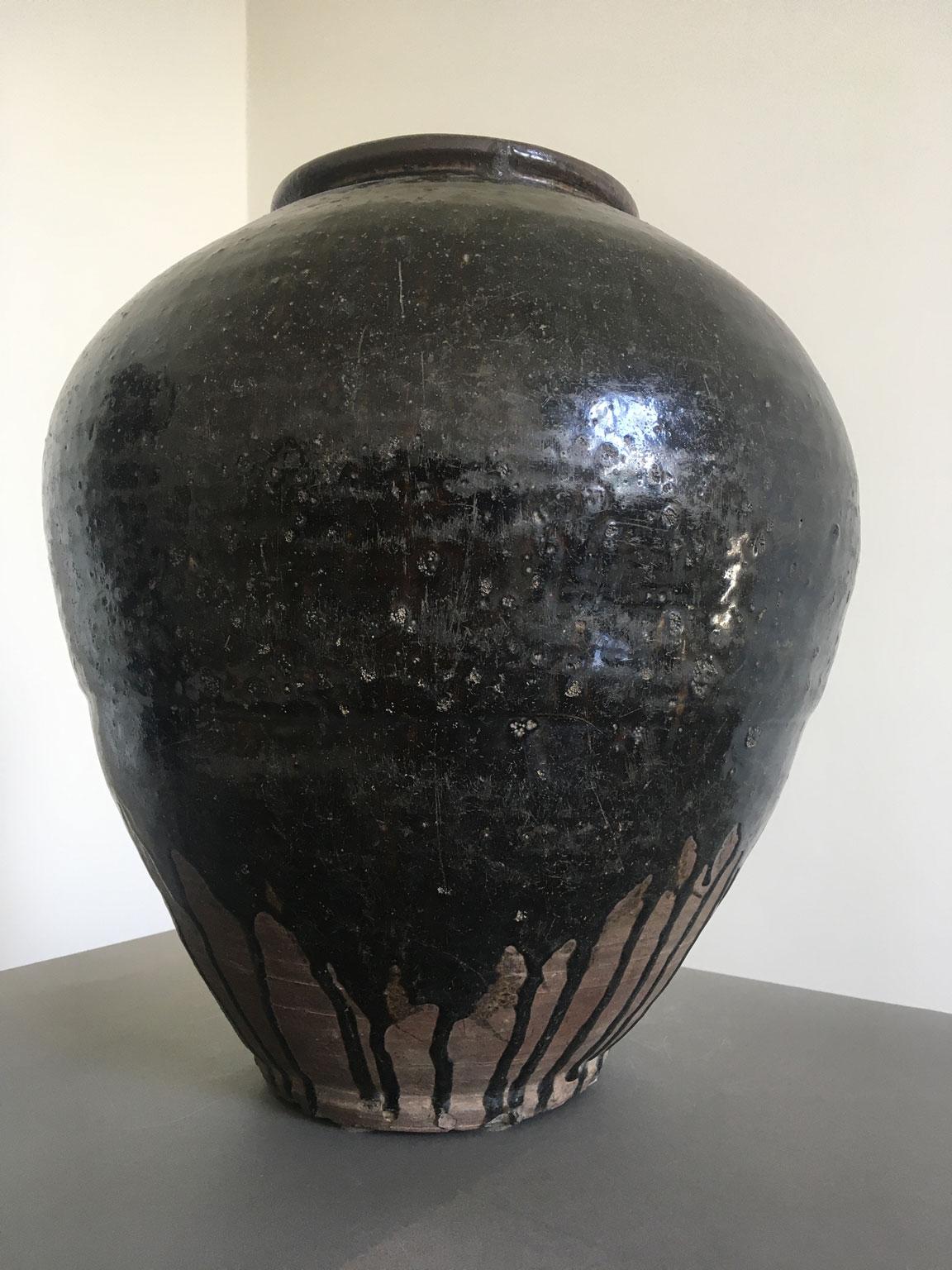 Hand-Crafted Late 18th Century Khmer Brown Glazed Terracotta Vase For Sale
