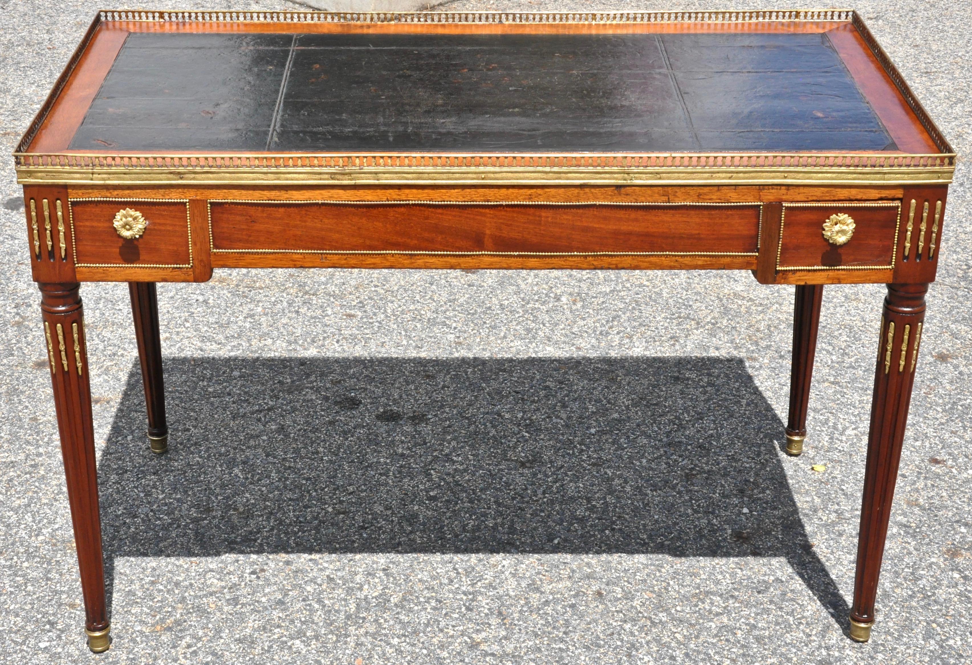 Period mahogany, ebony and bone Louis XVI backgammon or tric-trac games table

Original ormolu-mounted Louis XVI form with tapered and fluted legs. Original well with inlaid ebony, bone backgammon board. Opposing drawers to hold draughts.