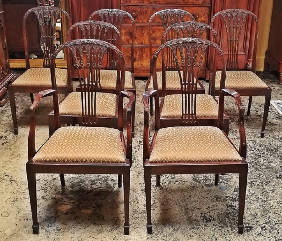 Offering an exceptional, rare and highly desirable set of period Hepplewhite style dining chairs from circa 1780.

Stunning set with beautifully hand-carved backs and central columns and spat.

2 carvers and 6 chairs.

Possibly American from