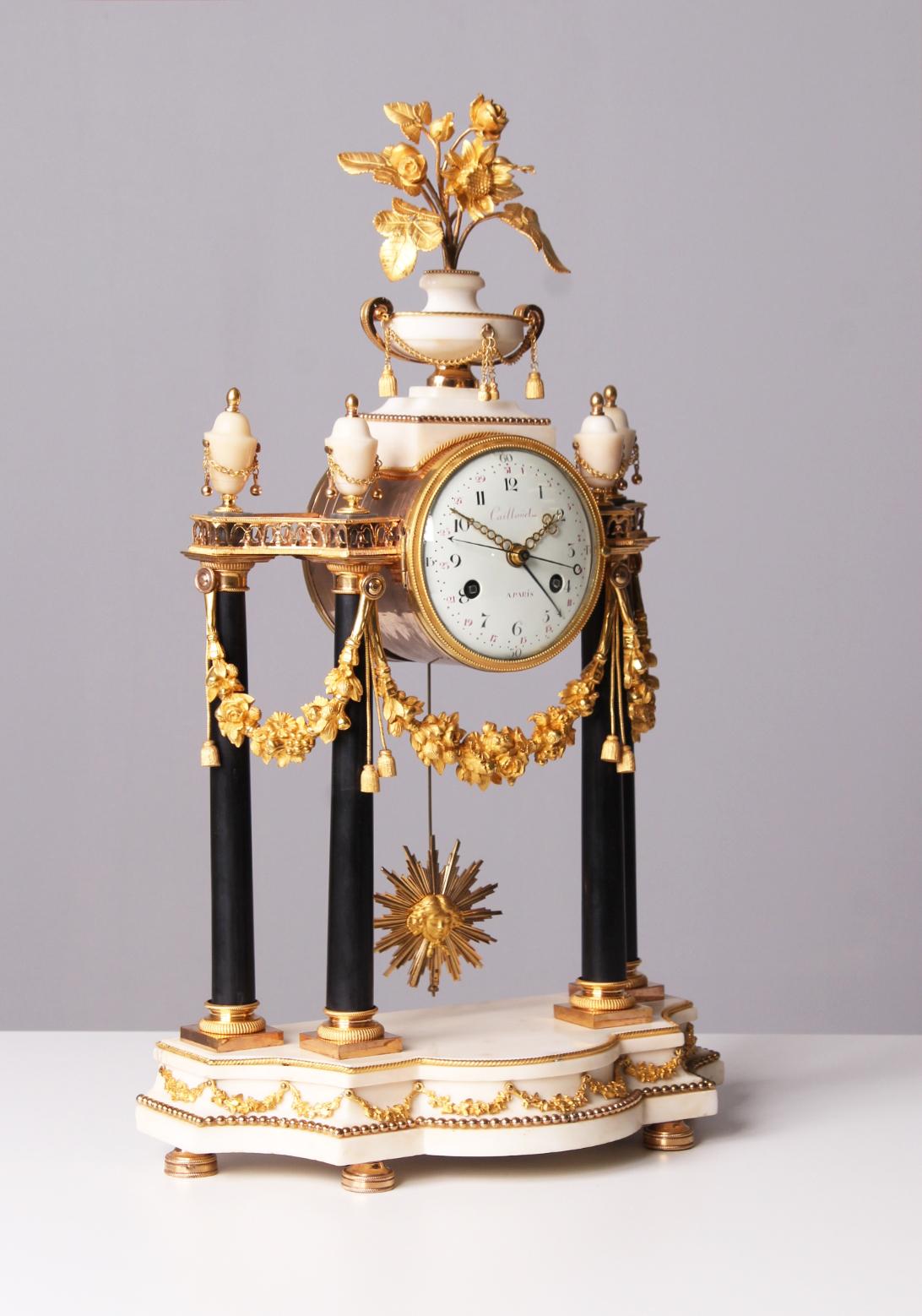 Large Louis XVI Portal mantel clock with date and seconds

Paris
Marble, fire-gilt bronze
Louis XVI c. 1790

Dimensions: H x W x D: 57 x 34 x 16 cm

Description:
Highly refined classical portal clock with detailed worked bronze and very