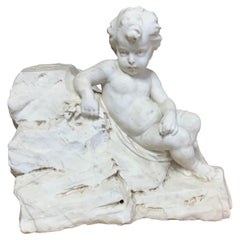 Cherubino sdraiato in marmo della fine del XVIII secolo