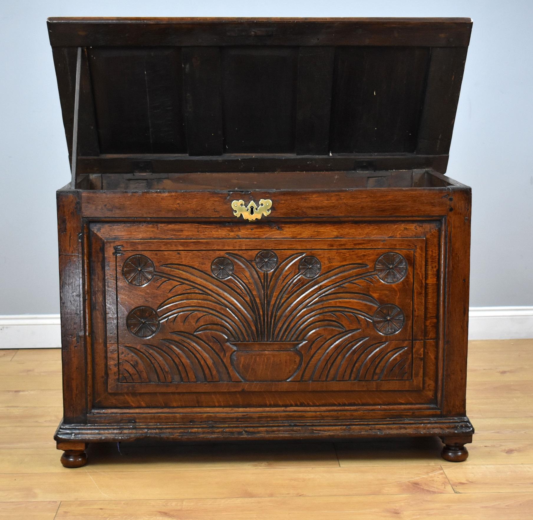 18th century carved Oak blanket chest/coffer in good condition having been recently polished by hand. Detailed carving to the front and stands on bun feet.