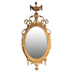 Late 18th century oval gilt mirror
