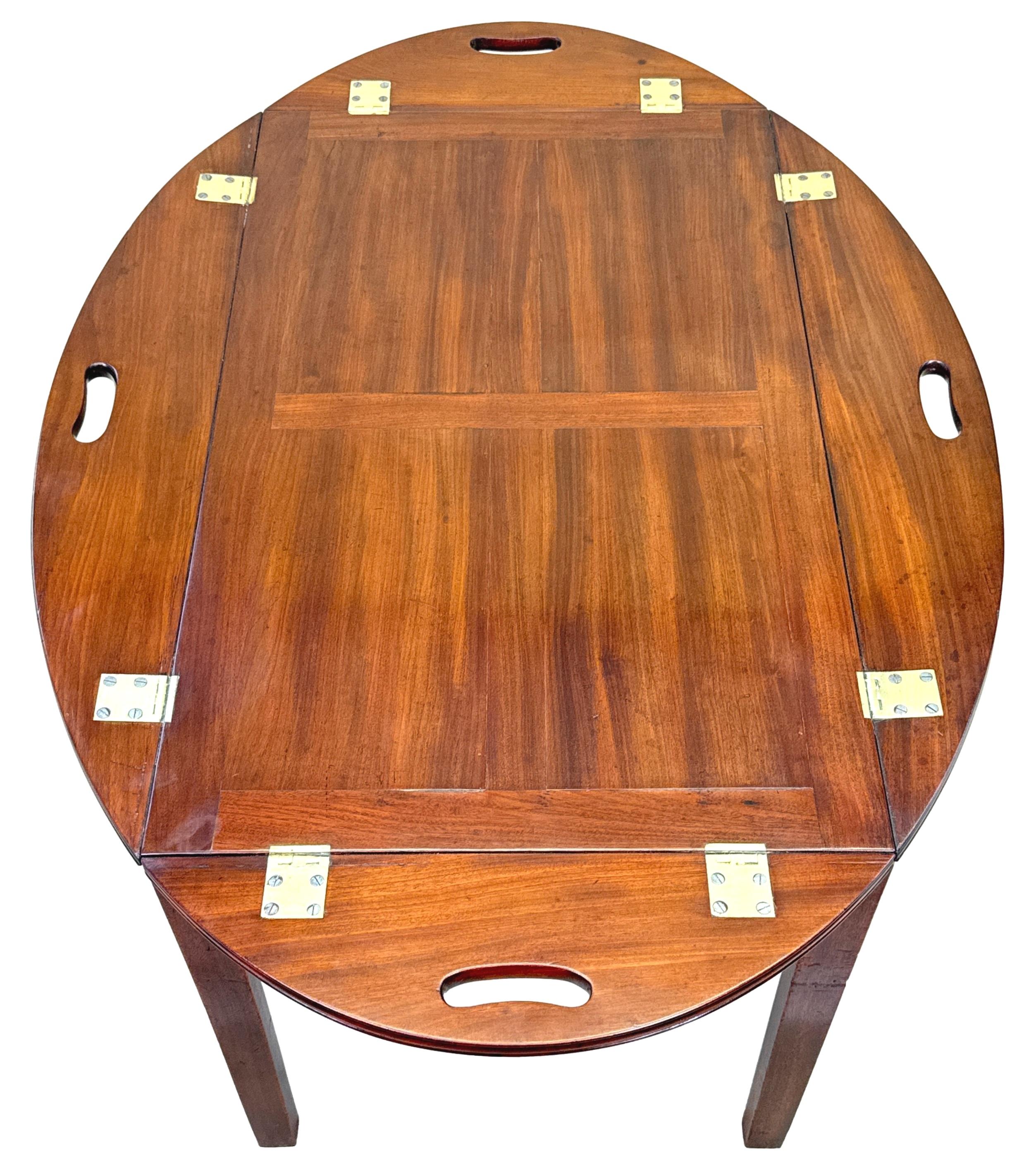 An Exceptional Quality Late 18th Century George III Perriod Mahogany Oval Butlers Tray, Of Good Bold Large Proportions And Typical Panelled Design, Retaining Original Brass Hinges To Folding Sides And Superb Rich Colour Throughout, Housed On Later