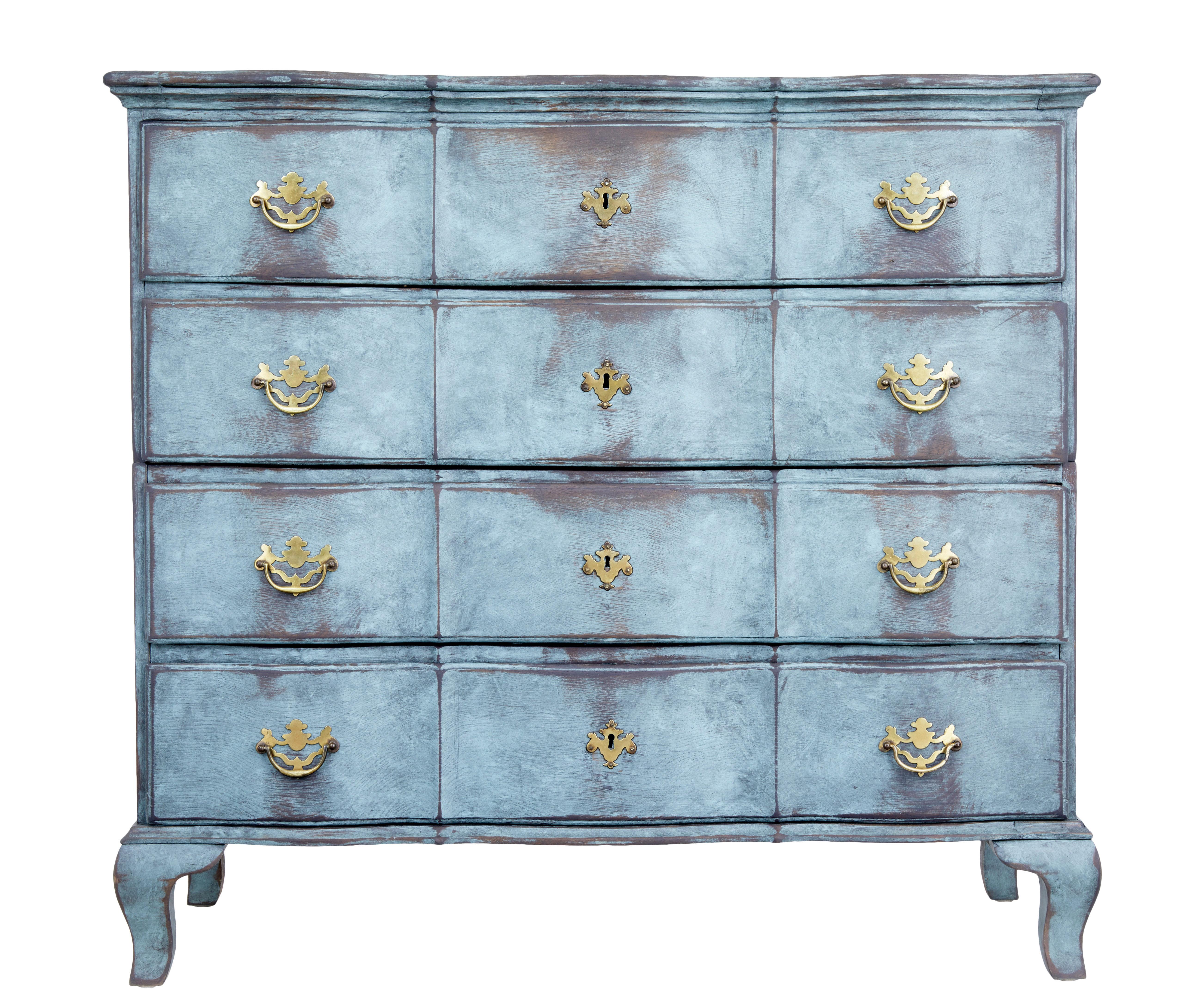 Danish painted chest of drawers of large proportions, circa 1790.

4 shaped drawers with ornate brass handles and key plates. Due to the size of the chest when made it was designed in 2 sections so it could be installed into smaller