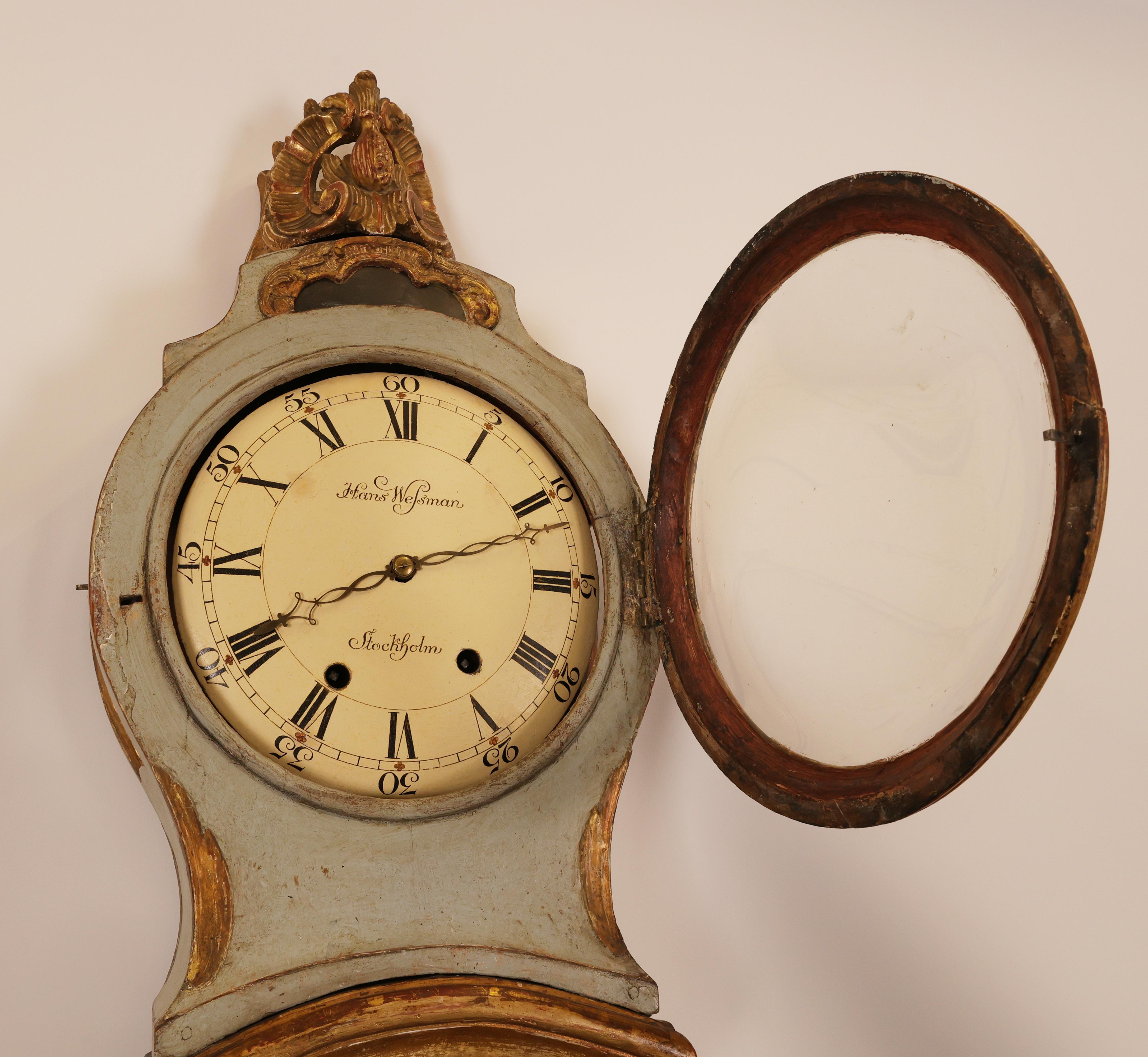 A high-class Rococo grandfather clock made in Stockholm, Sweden in the 1780s. The clock features rich gilded carvings in typical Rococo forms. The movement is signed by Hans Wessman, a watchmaker in Stockholm from 1787 to 1805. The gilding is