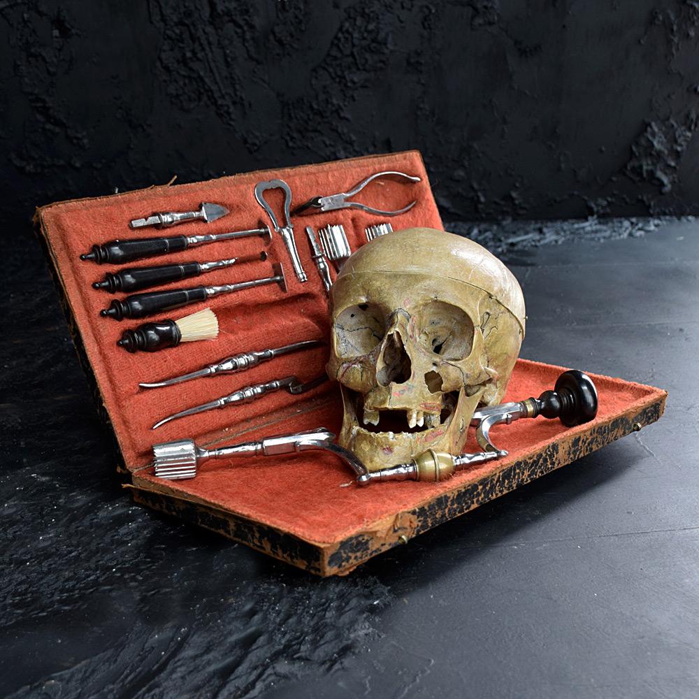 Late 18th century royal stamped trepanning set

We are proud to offer a rare, complete trepanning set dated from the late 18th century, punch stamped with royal crest motifs and makers mark of Gotzand. Ebonised wooden sections with metal