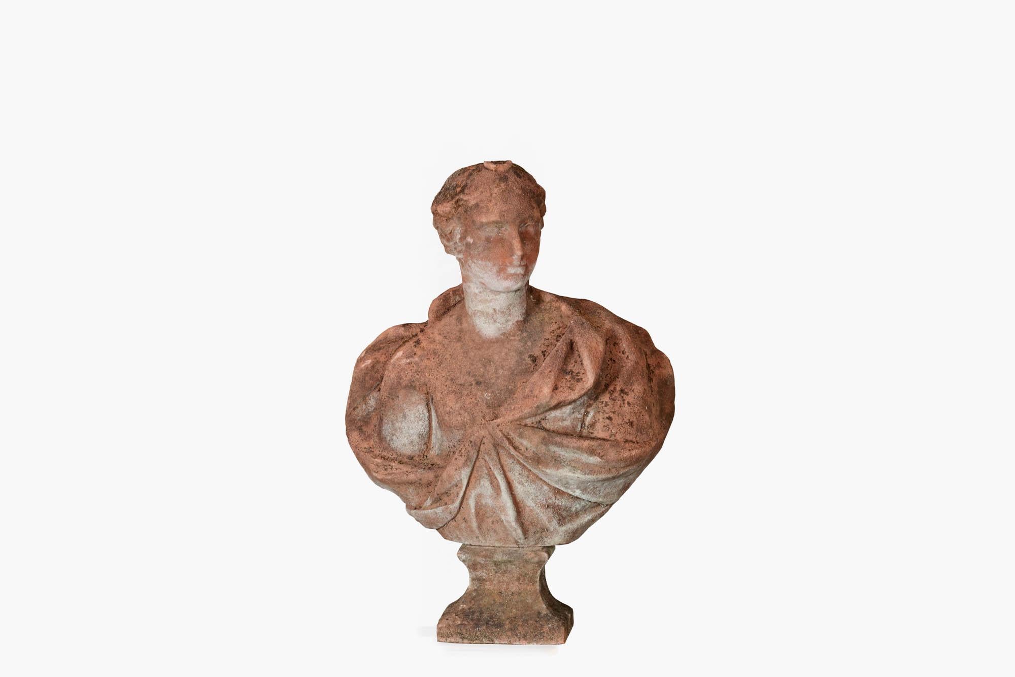 Late 18th century neo-classical style hand-carved sandstone bust of a lady in classical Greco-Roman dress. Possibly a depiction of Daphne who was a Naiad nymph in Greek mythology; naiads were minor goddesses associated with fountains, wells,