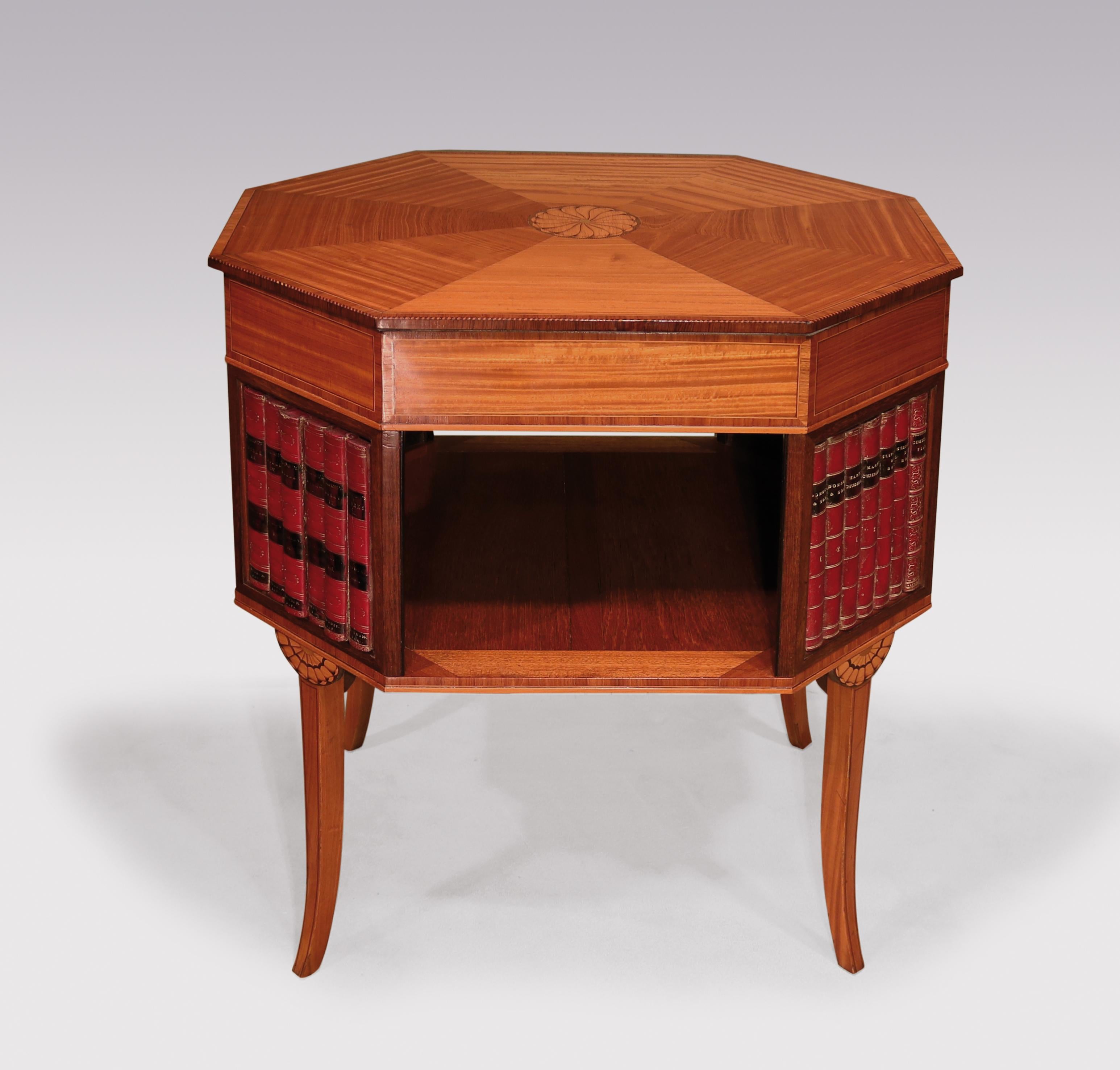 An unusual late 18th century Sheraton period satinwood occasional table having chequered strung tulipwood banded octagonal segmented top centred with scalloped roundel panel, above frieze with concealed cedar lined drawer. The piece, with open shelf