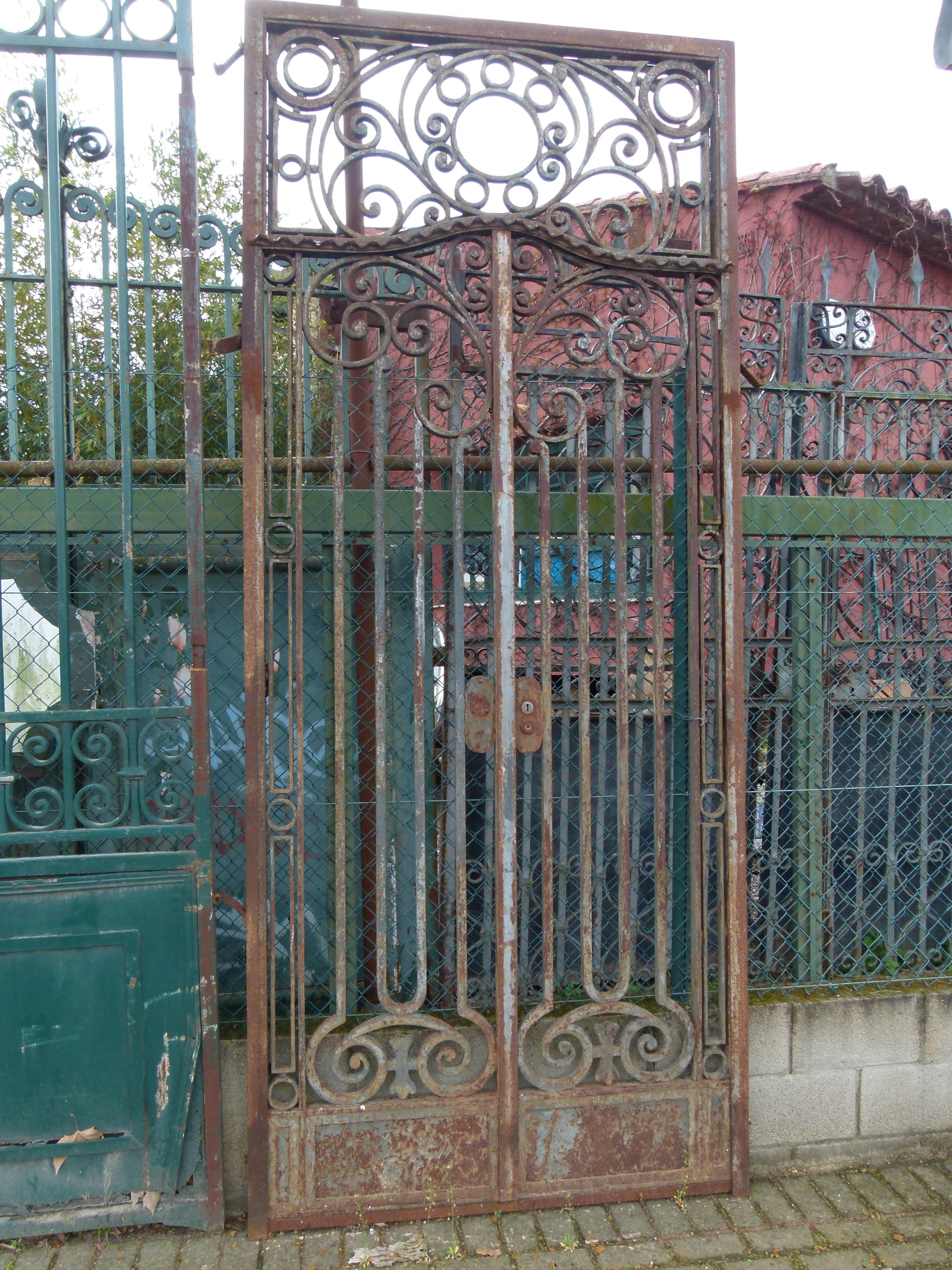 Late 18th Century Garden Front Gate. Original patina and rusty surface.
Framed door and assembled with rivets, since the method of welding in this period was not yet used.
 