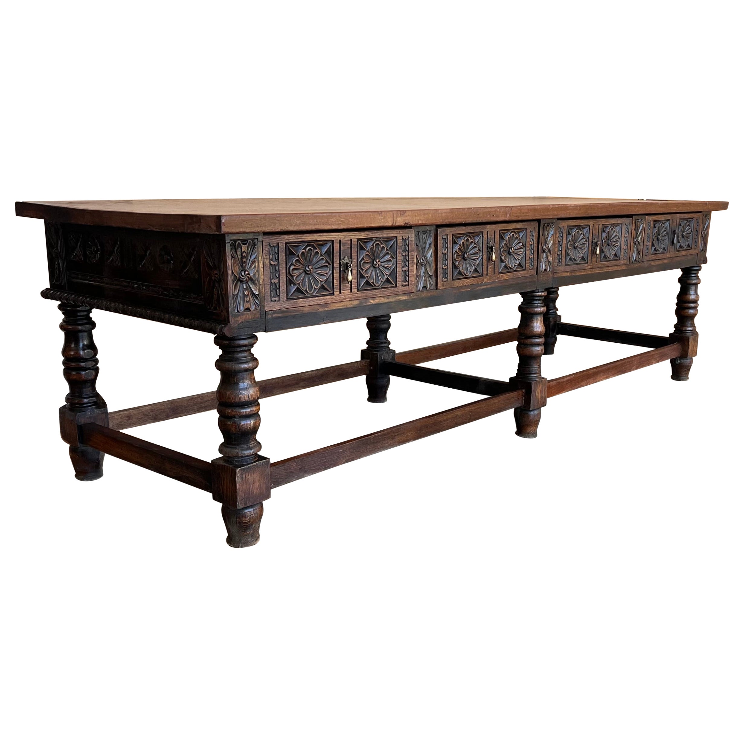 Pieza única Mesa de refectorio española del siglo XVIII. Preciosa consola. Impresionante mesa de labranza con cuatro cajones
Tallado geométrico en frontal y laterales con herrajes de hierro en cajones
Completamente restaurado.

