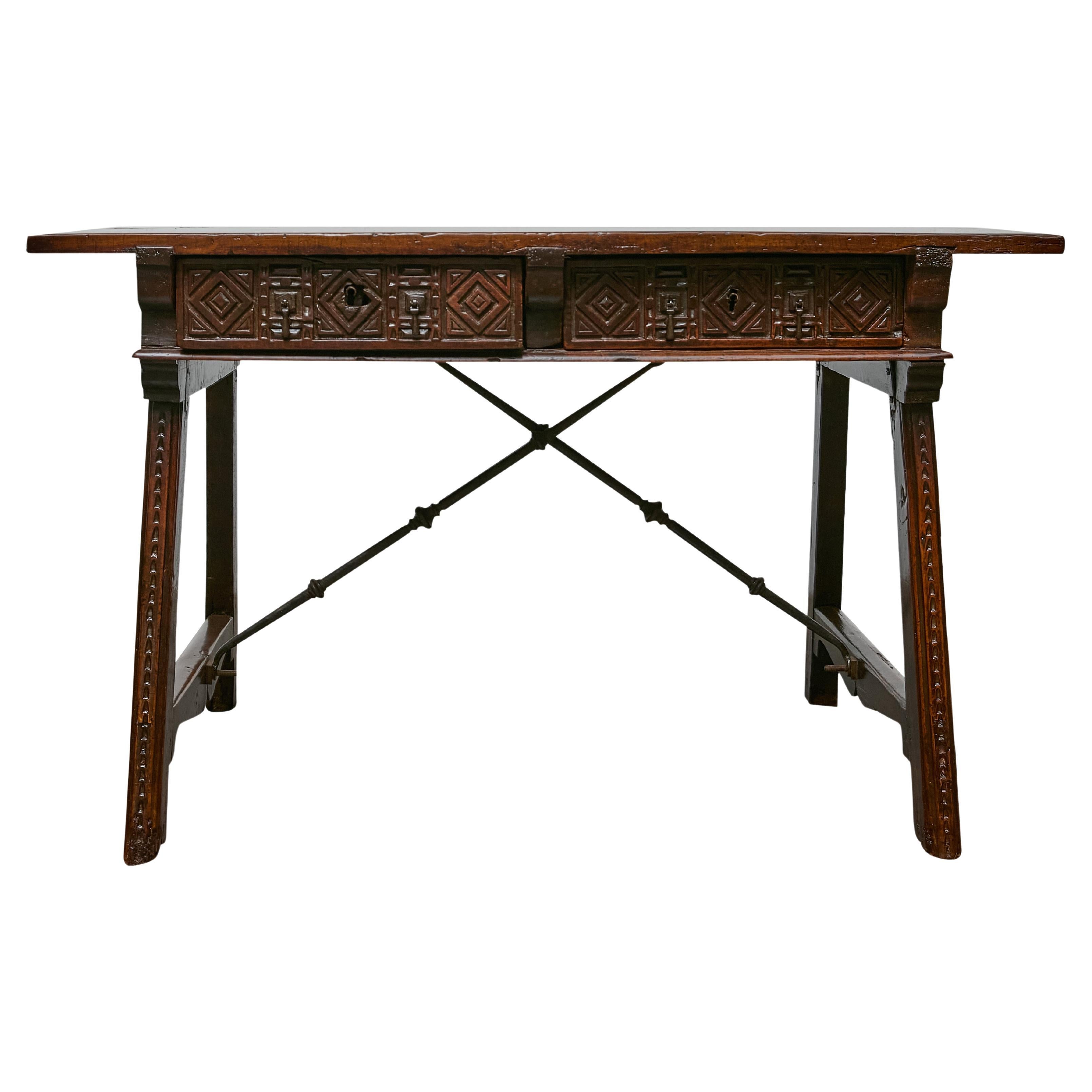 Late 18th Century Spanish Walnut Table with Carved Drawer Fronts and Iron Stretc For Sale
