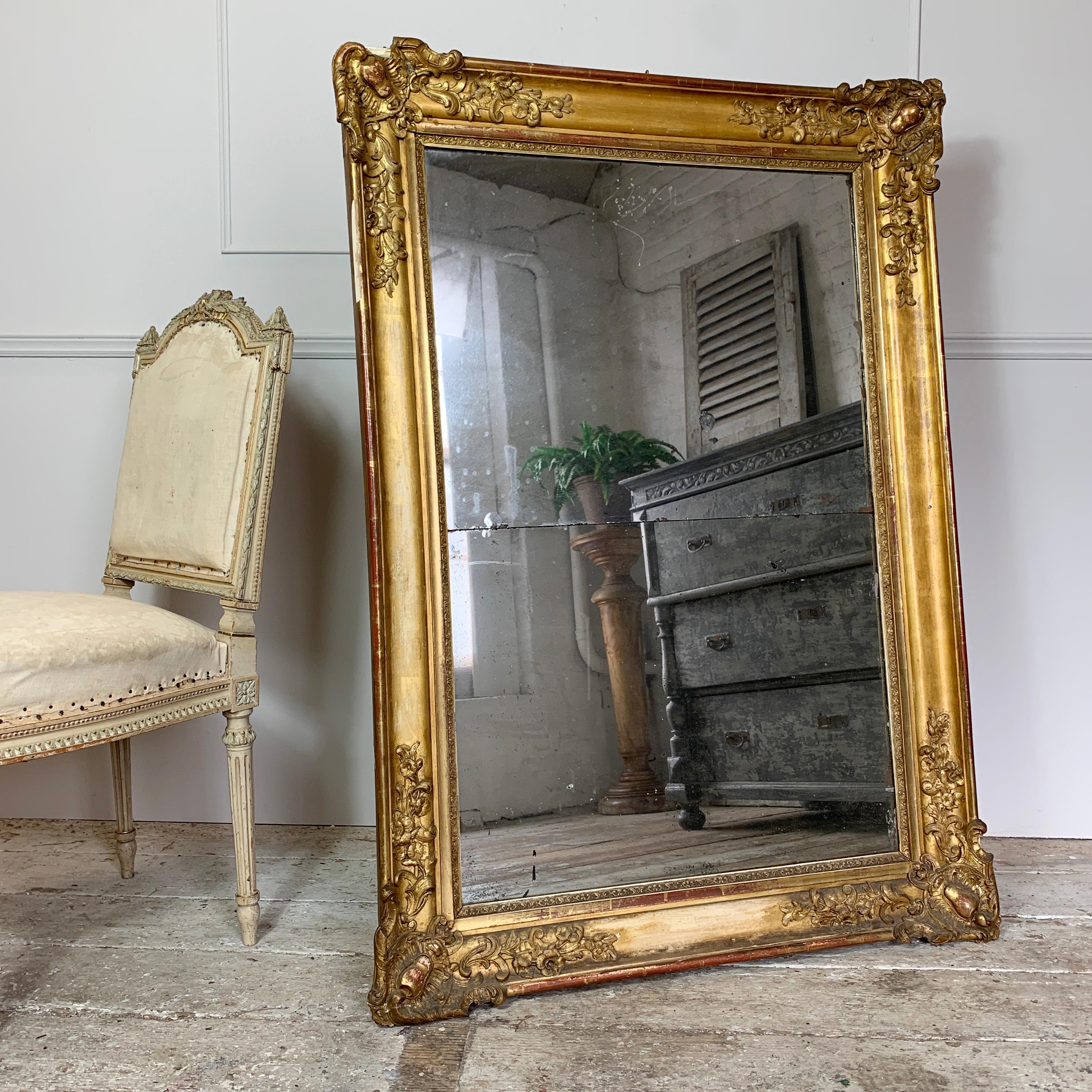 Beautiful Gilt Swept Split plate French mirror. Late 18th Century, Silver Backed Mirror Plates

Fabulous Twin Plate Mirror With Foxing And Historical Wear Throughout

The Frame Has Some Areas Of Gesso Loss As Shown
The Back Of The Mirror Has