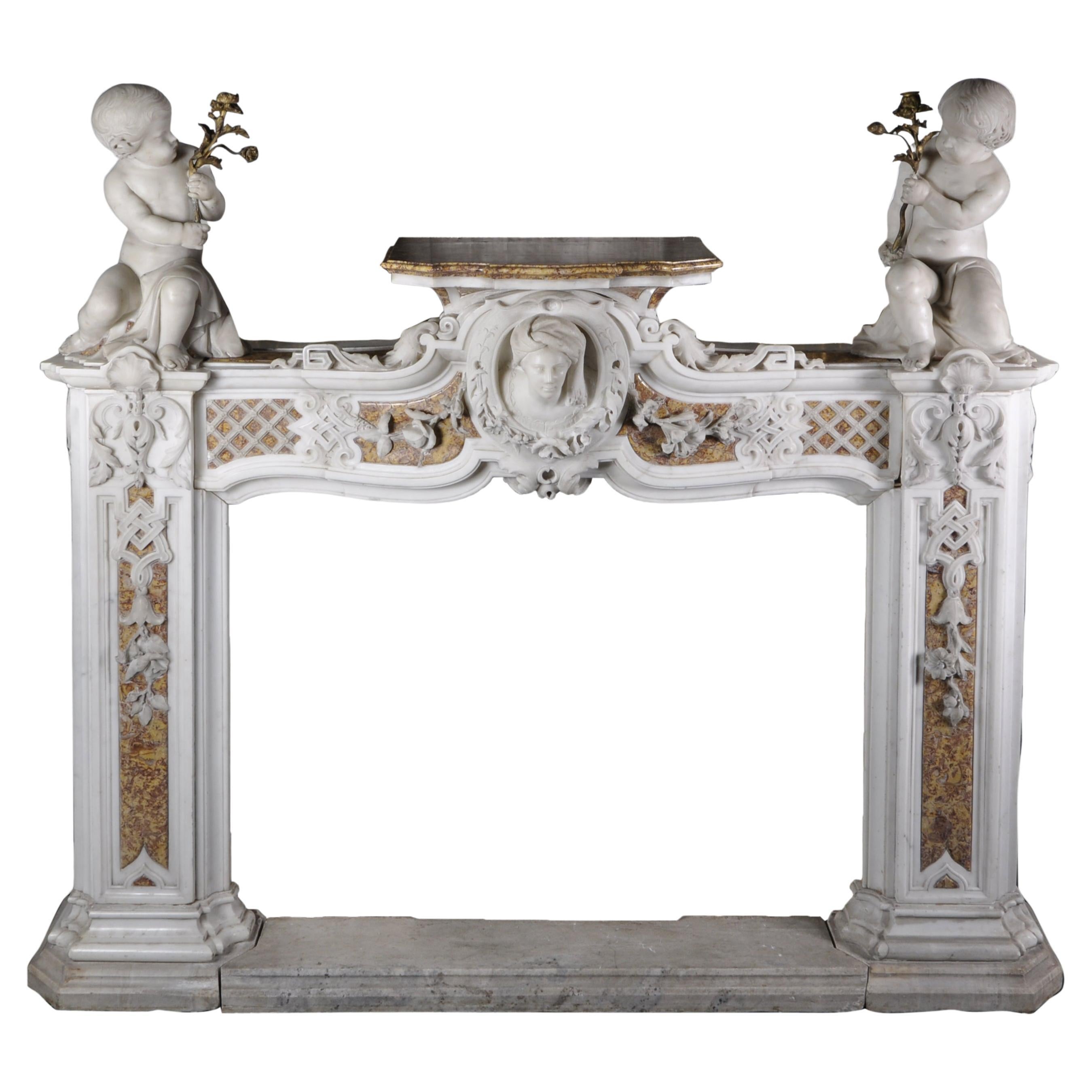 Late 18th century Statuary and Brocatelle marble fireplace with putti For Sale