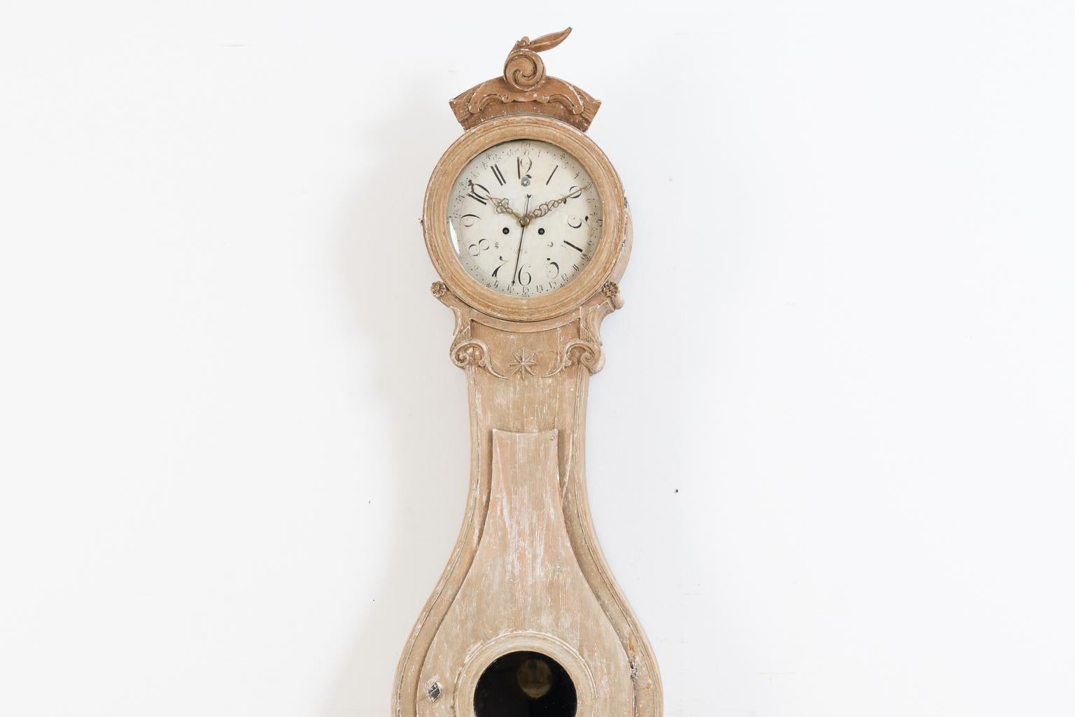 Rococo long case clock from Fryksdalen in Värmland, northern Sweden. The model is often called Fryksdalsur in Swedish after the place it was manufactured - Fryksdalen - and 'ur' being the Swedish word for clock. The clock is dry scraped to original