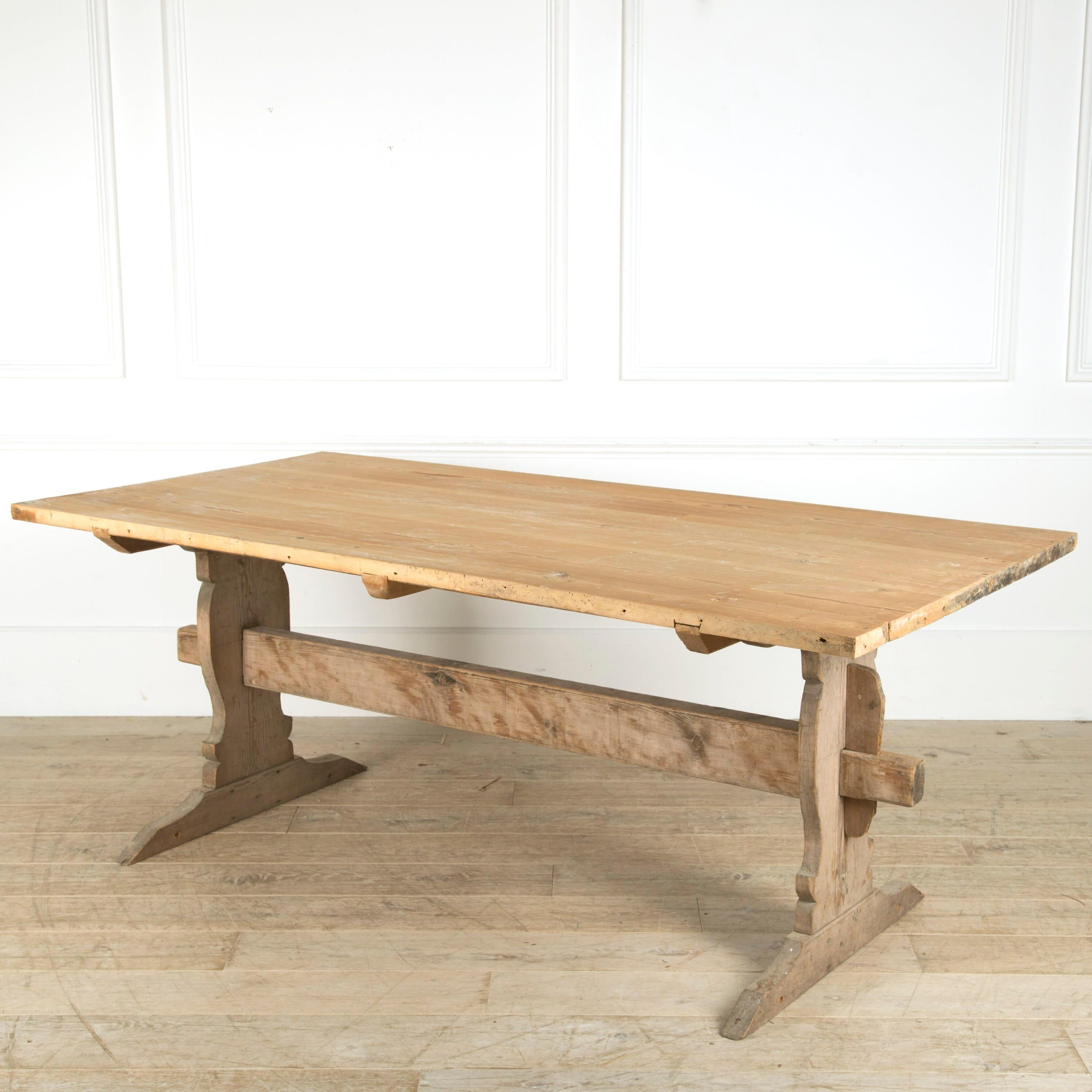 A late 18th century pine trestle table from Dalarna.