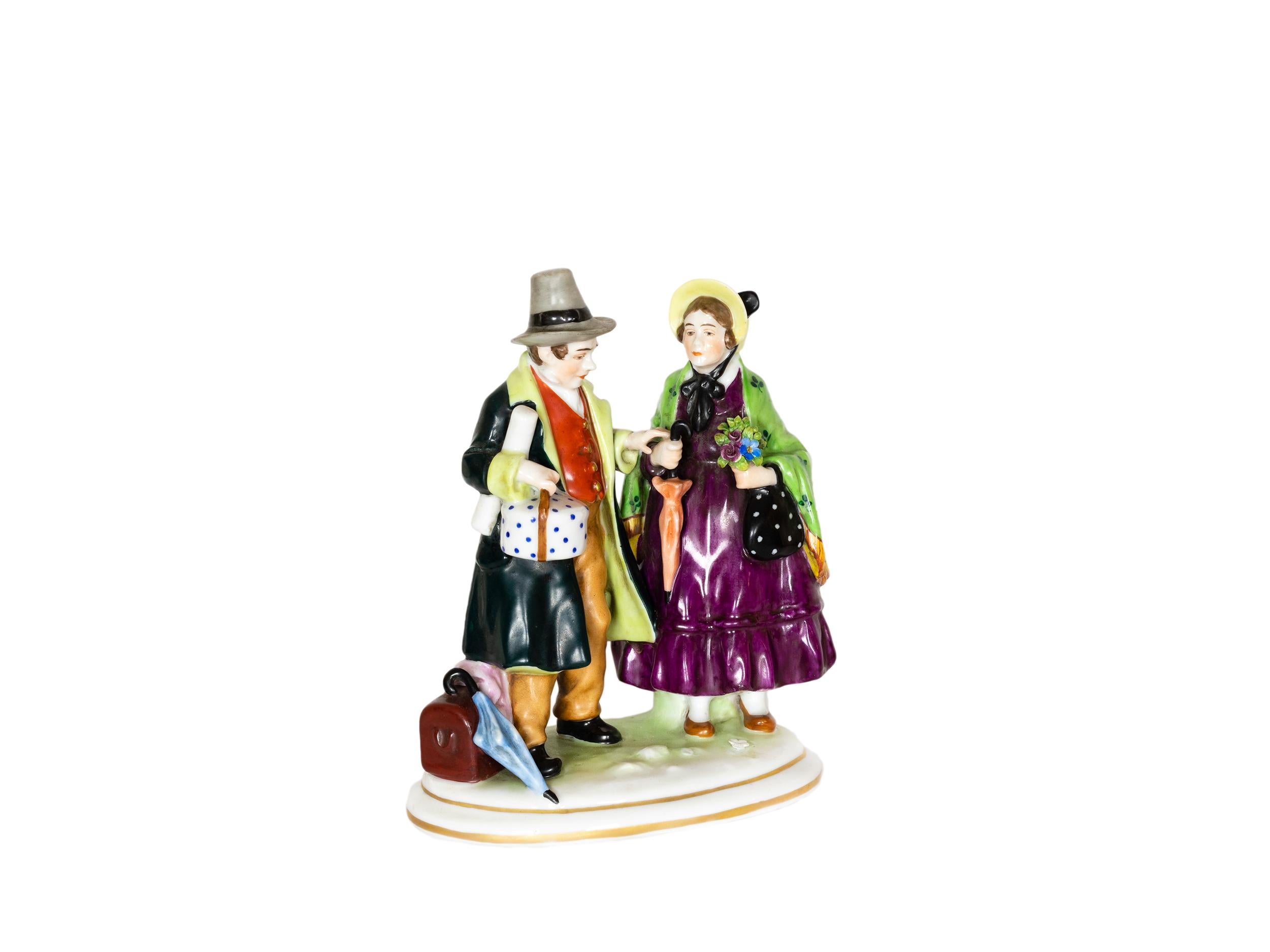 A charming translucent soft-paste porcelain figurine of a traveling couple with suitcases, a delicate piece in excellent condition. 
The woman wearing a clover etched jacket.
Capodimonte Italian Porcelain mark (1771 to 1834) on the bottom.